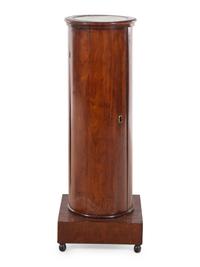 A Continental Mahogany Pedestal Cabinet