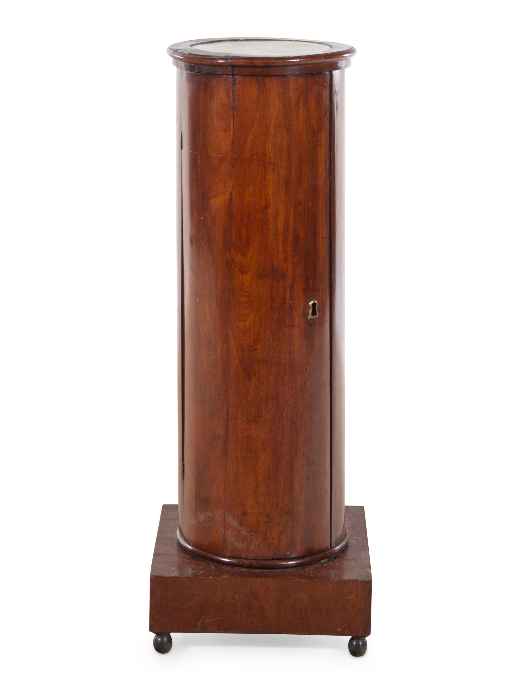 A Continental Mahogany Pedestal Cabinet
