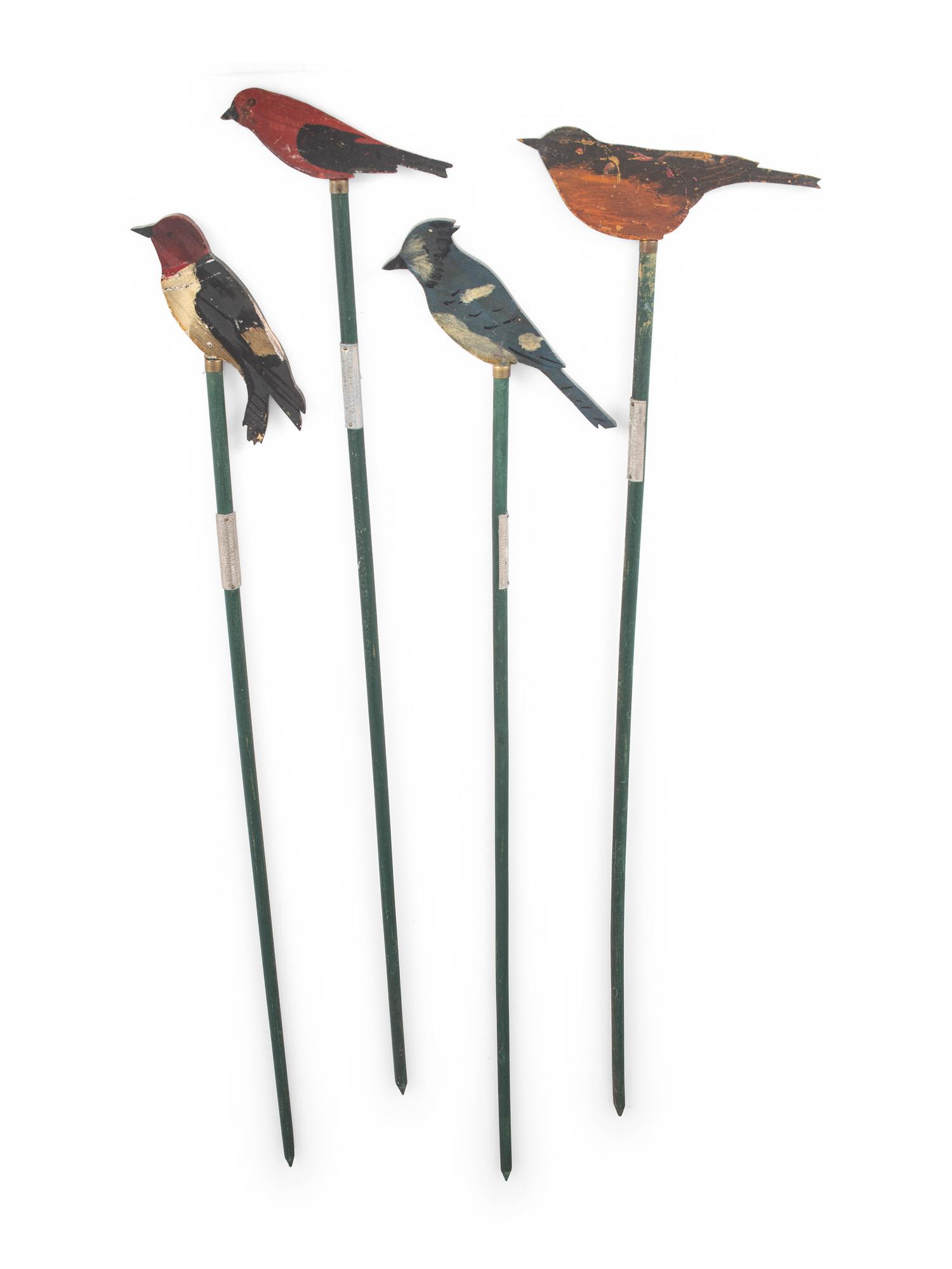 A Set of Four Joseph Dodson Carved and Painted Wooden Birds