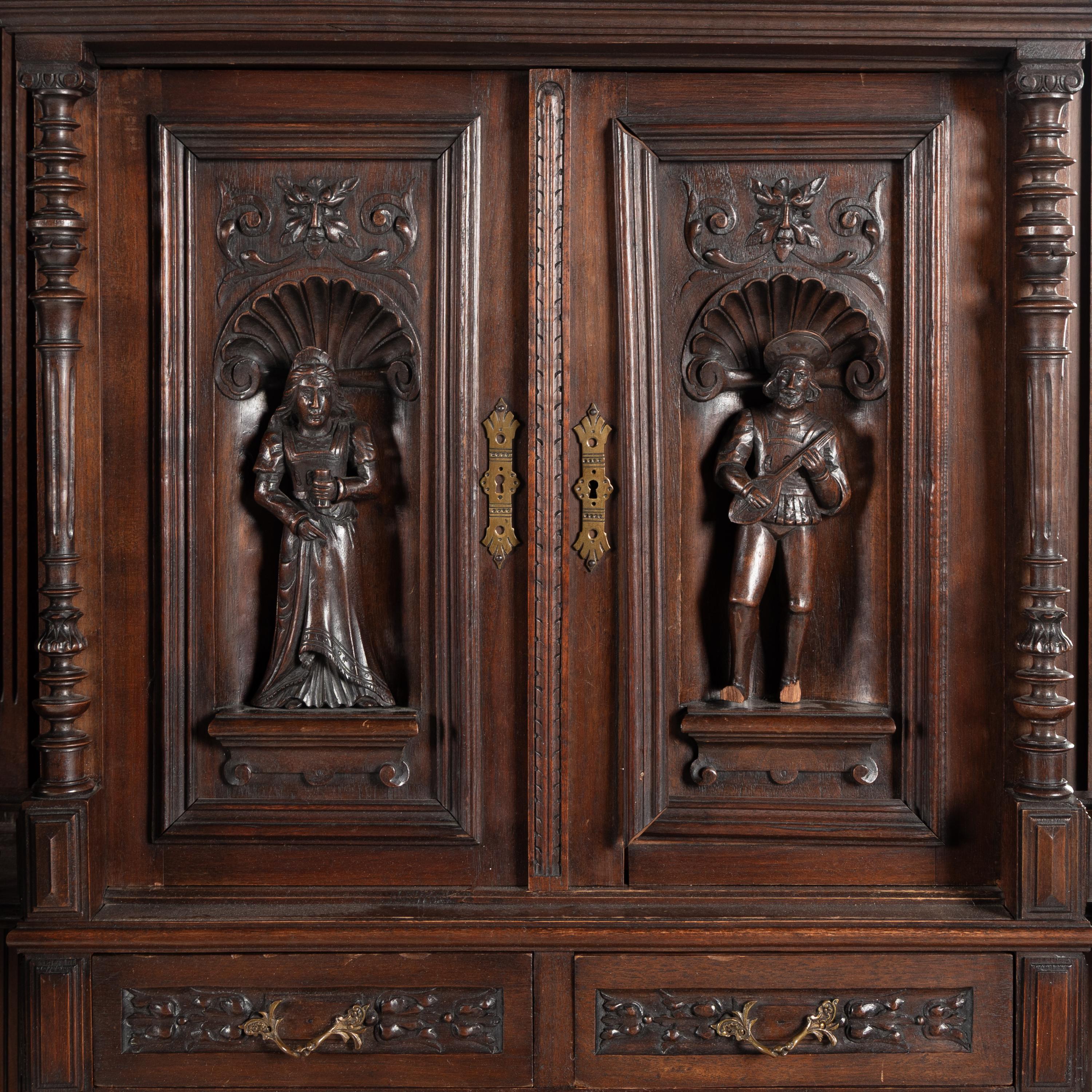 A Pair of French Renaissance Revival Walnut Serving Cabinets