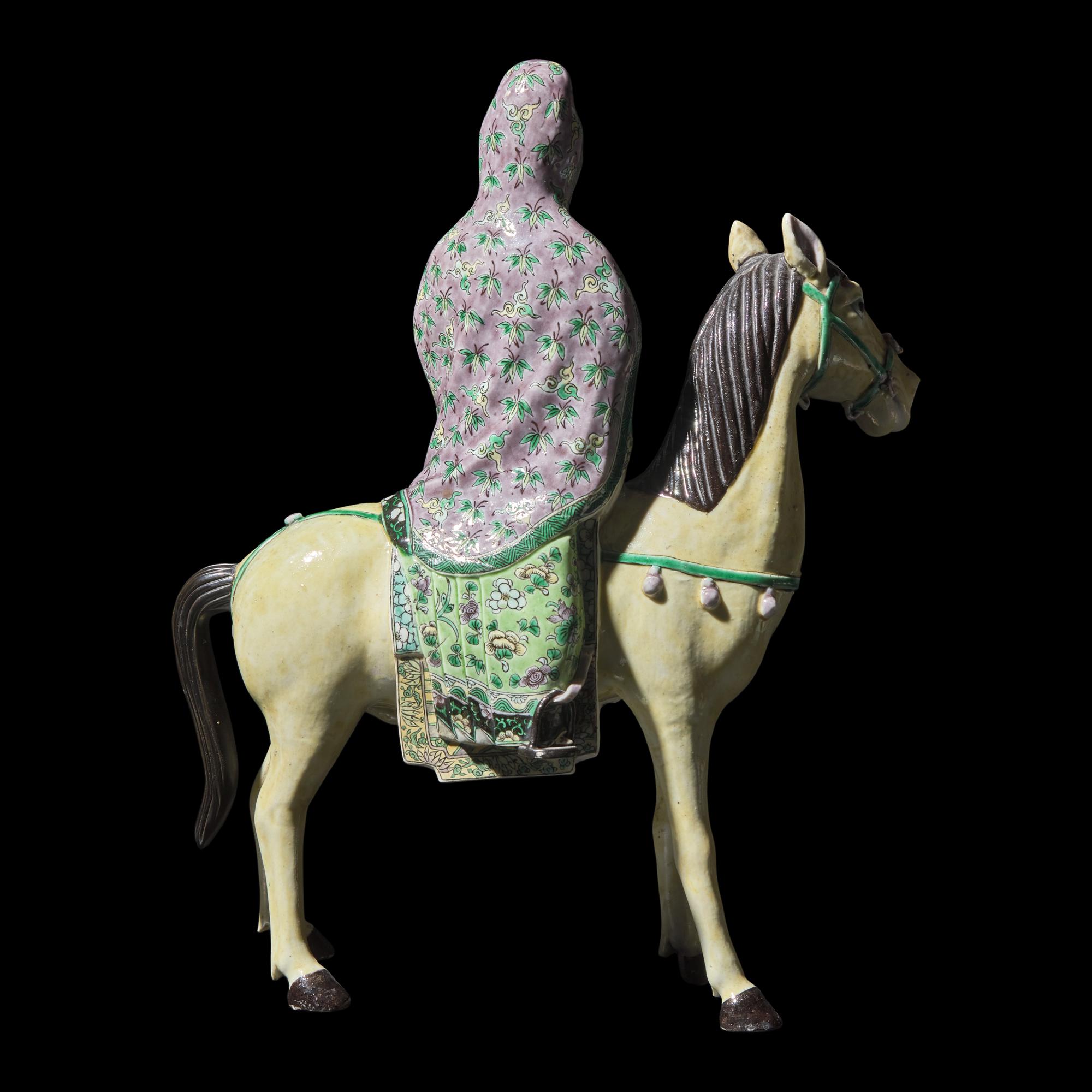 A Chinese Famille Verte Equestrienne Figure, Late Qing/Republic Period 晚清-民國 素三彩騎馬女俑