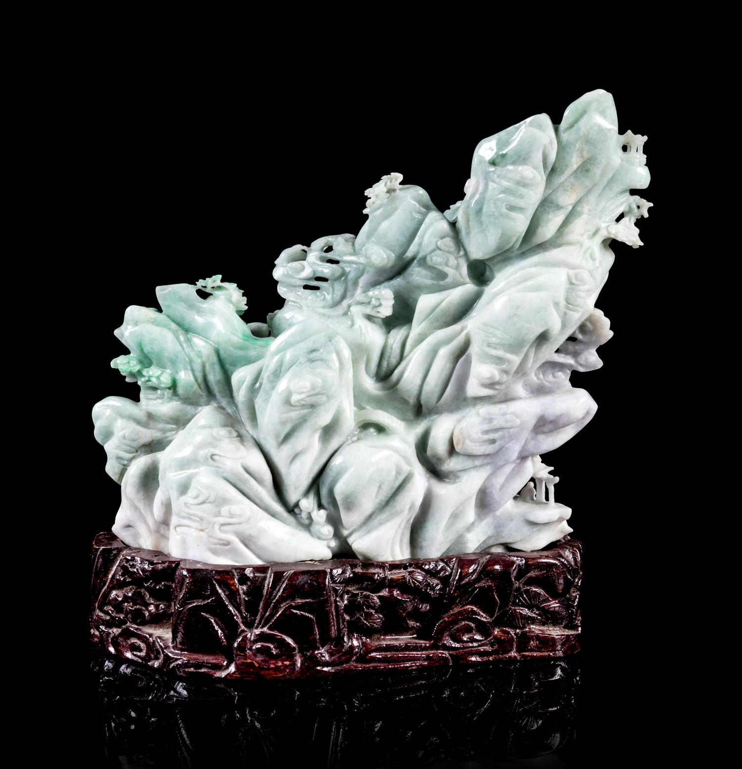 A Chinese Light Lavender and Celadon Jadeite Figural Group