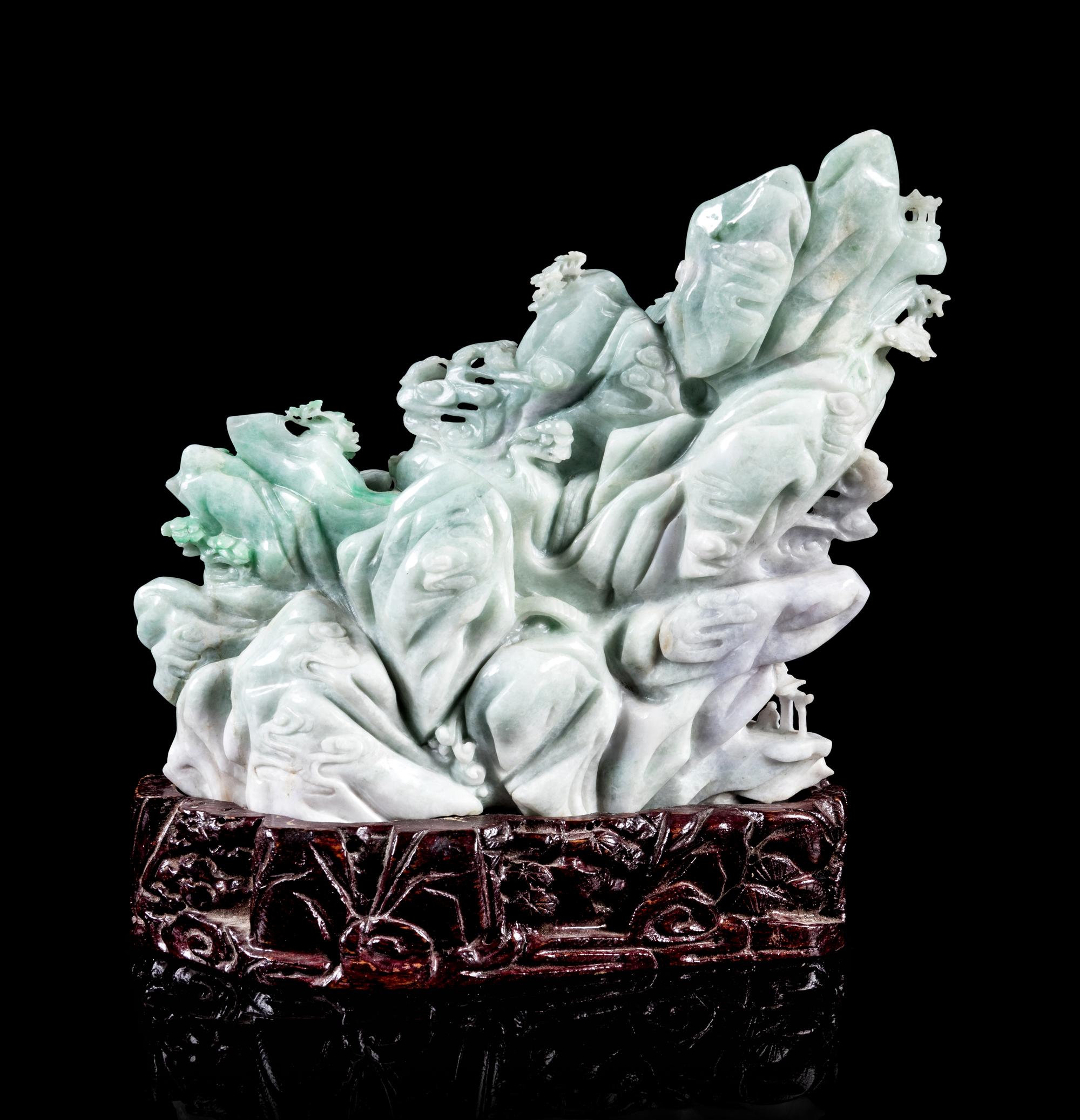 A Chinese Light Lavender and Celadon Jadeite Figural Group