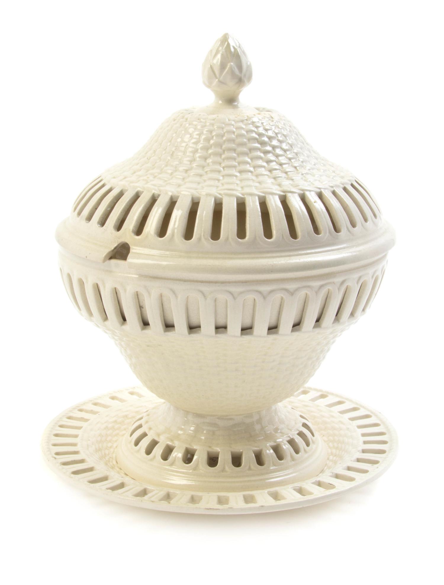 An English Creamware Reticulated Tureen and Underplate, Height 10 1/2 inches.