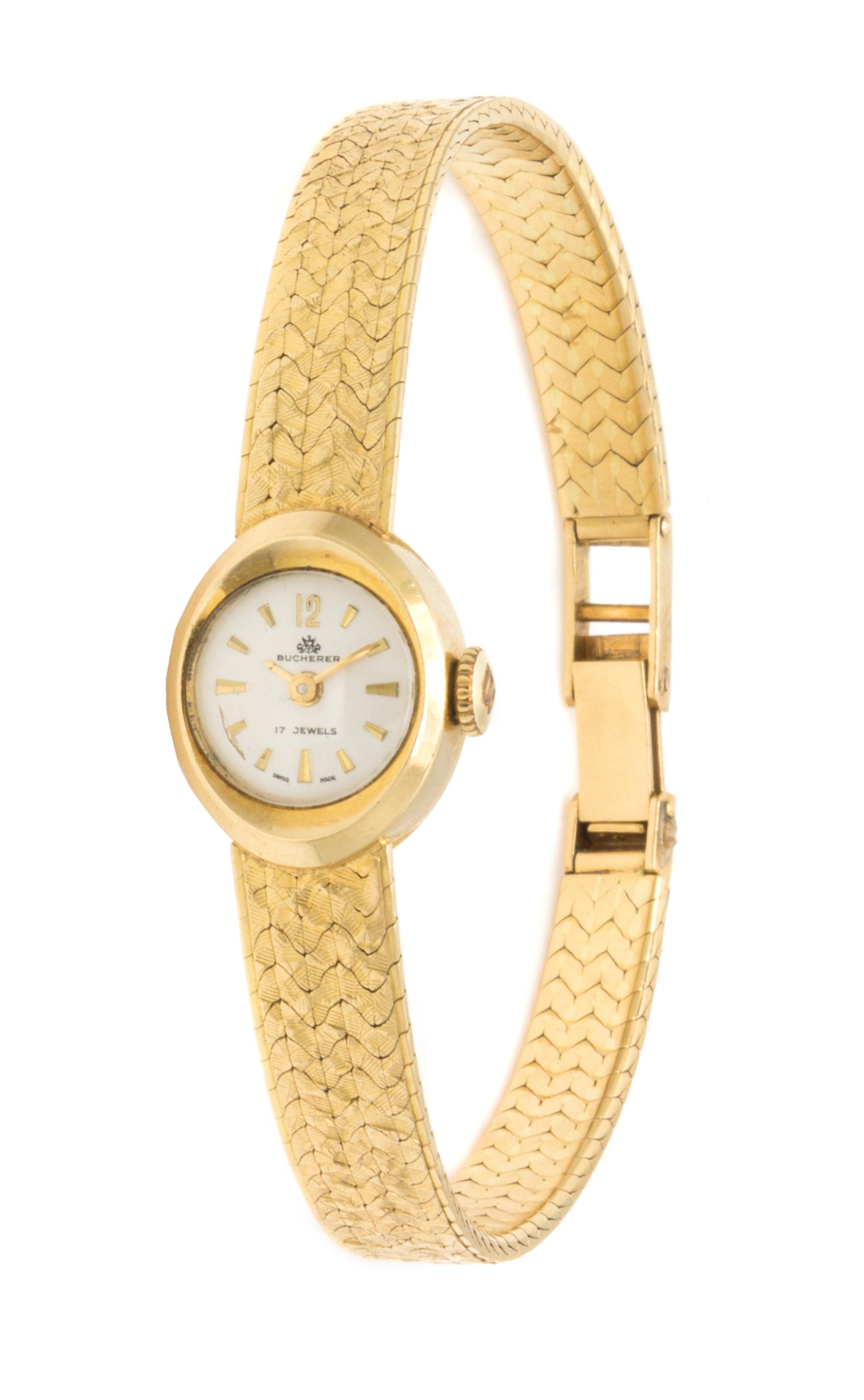 An 18 Karat Yellow Gold Wristwatch, Bucherer, 21.00 dwts.
