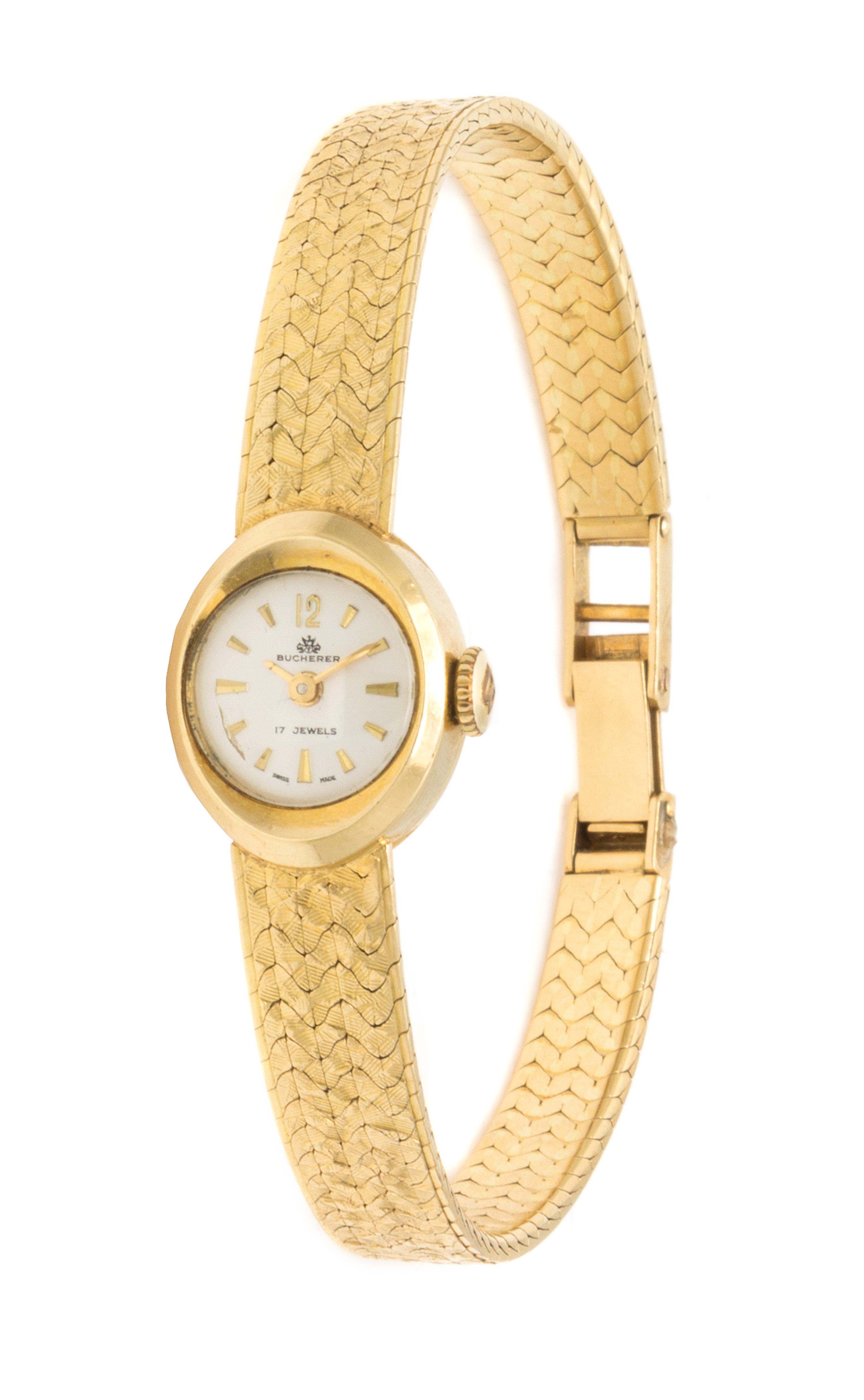 An 18 Karat Yellow Gold Wristwatch, Bucherer, 21.00 dwts.