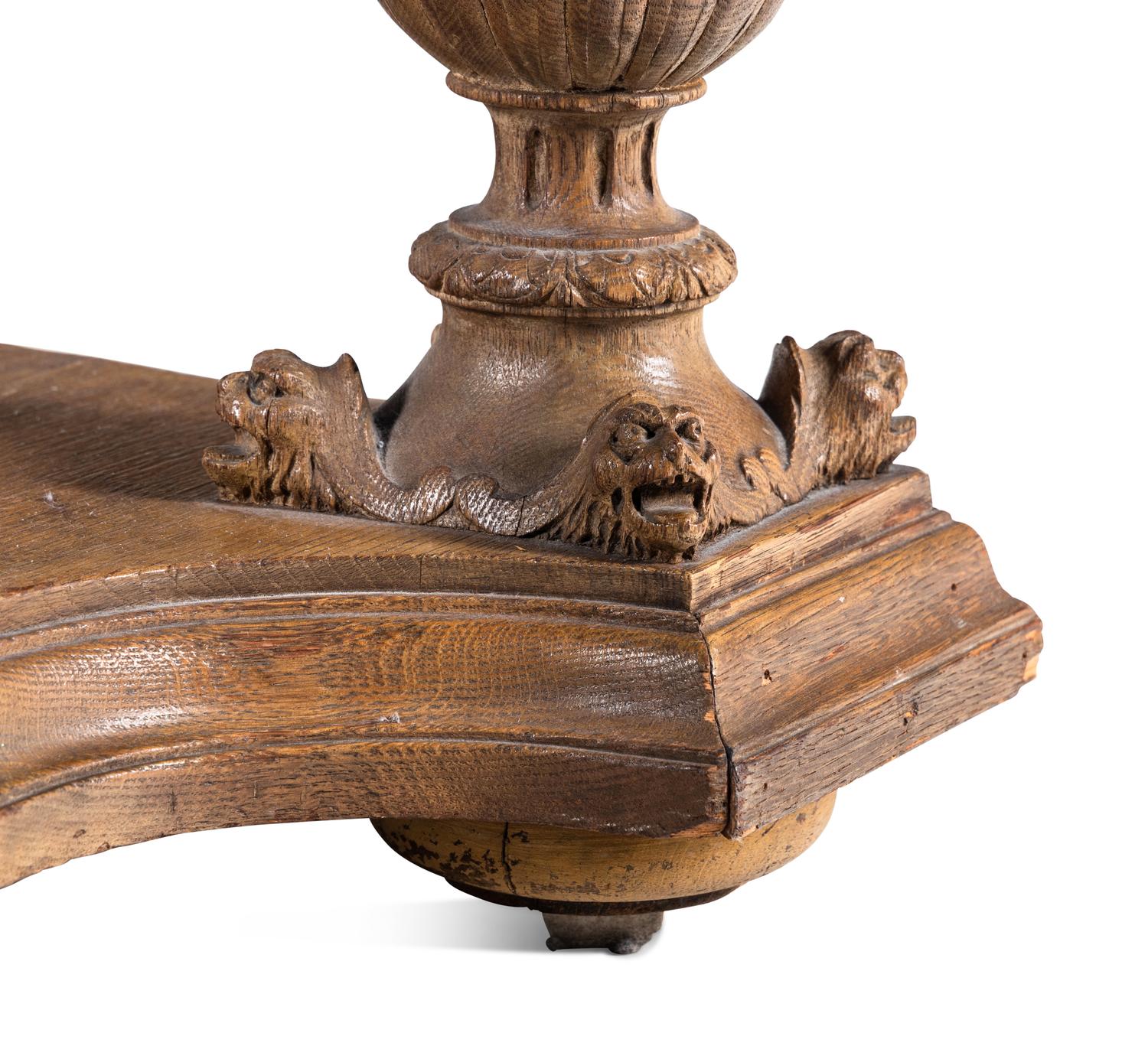 A Belgian Carved Oak Marble-Top Pier Table