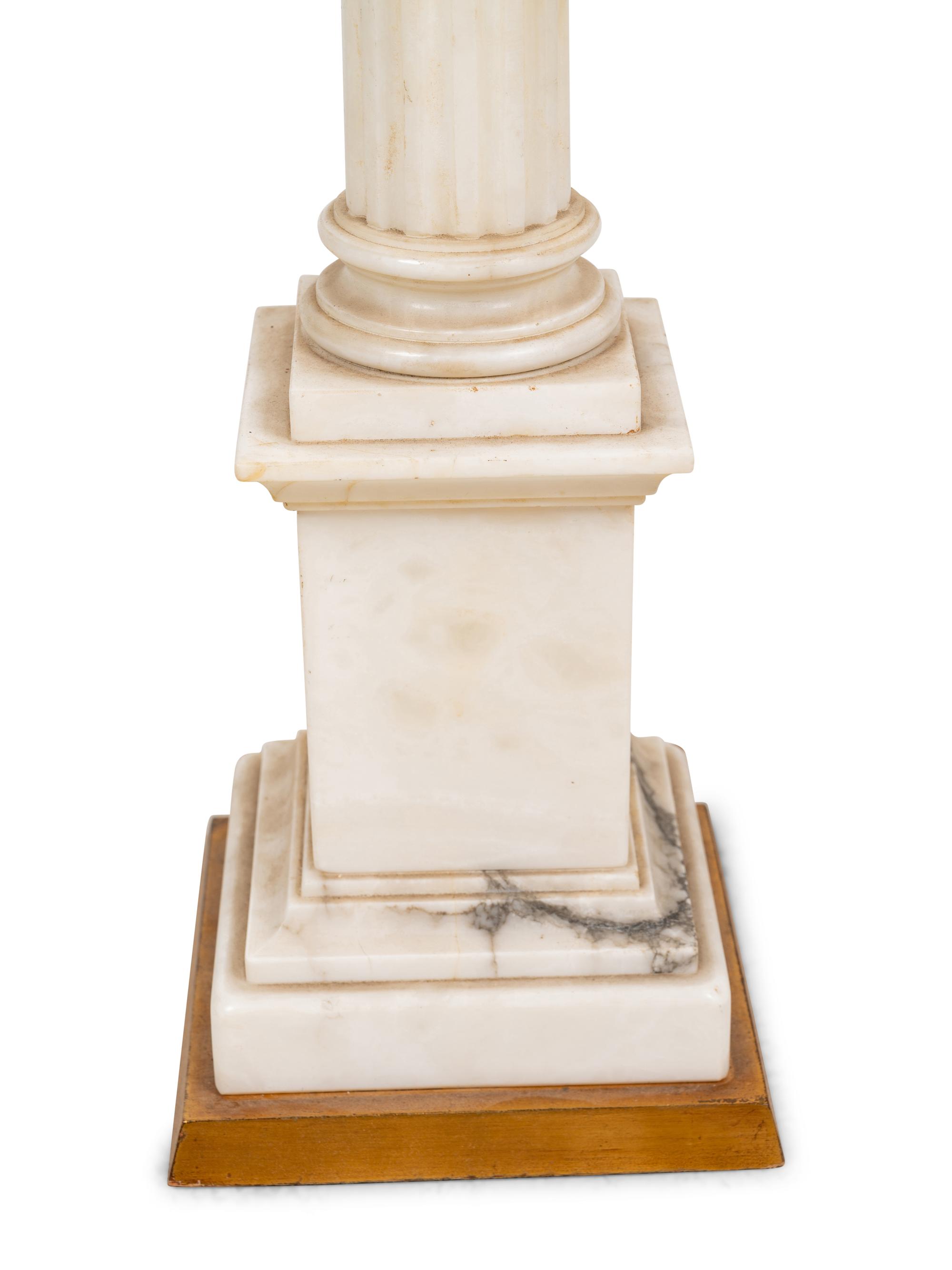 A Carved Marble Columnar Lamp