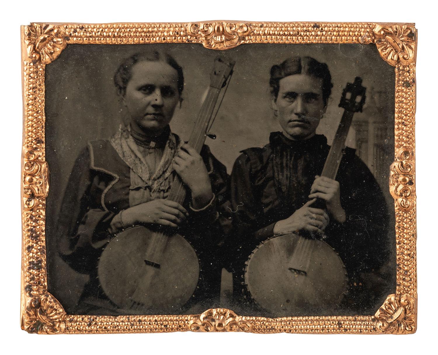 [EARLY PHOTOGRAPHY]. Ninth plate tintype of two female banjoists.