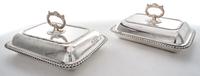 A Pair of Sheffield-plate Entree Dishes and Covers, Early 19th Century, of rounded rectangular form with gadrooned borders.