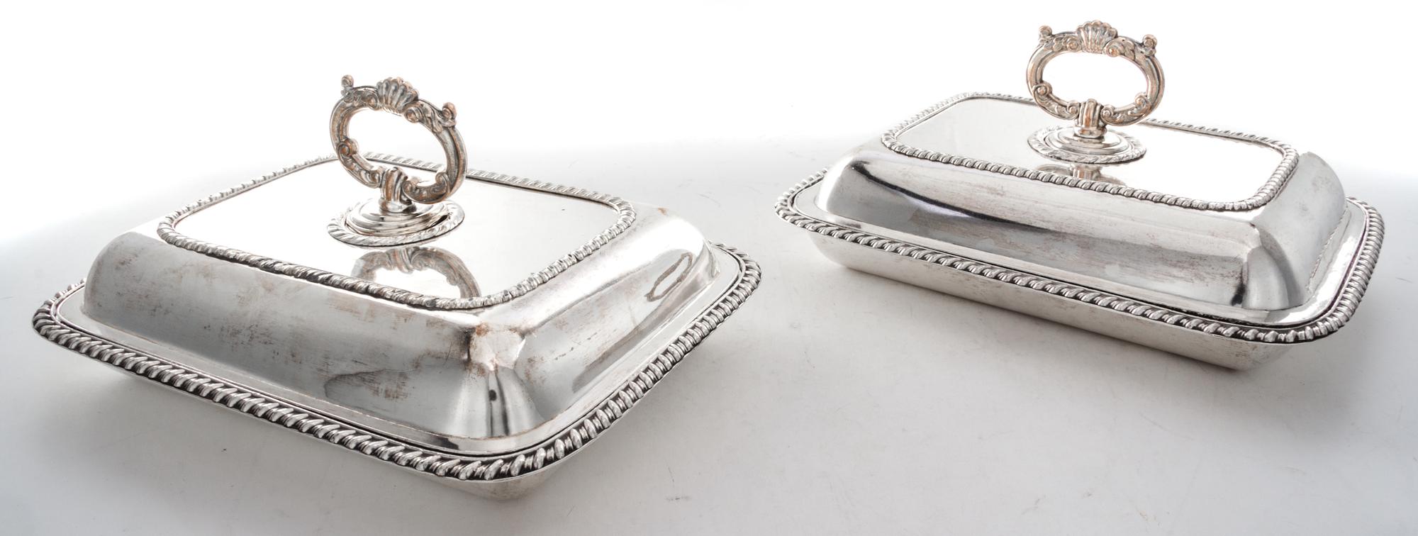 A Pair of Sheffield-plate Entree Dishes and Covers, Early 19th Century, of rounded rectangular form with gadrooned borders.
