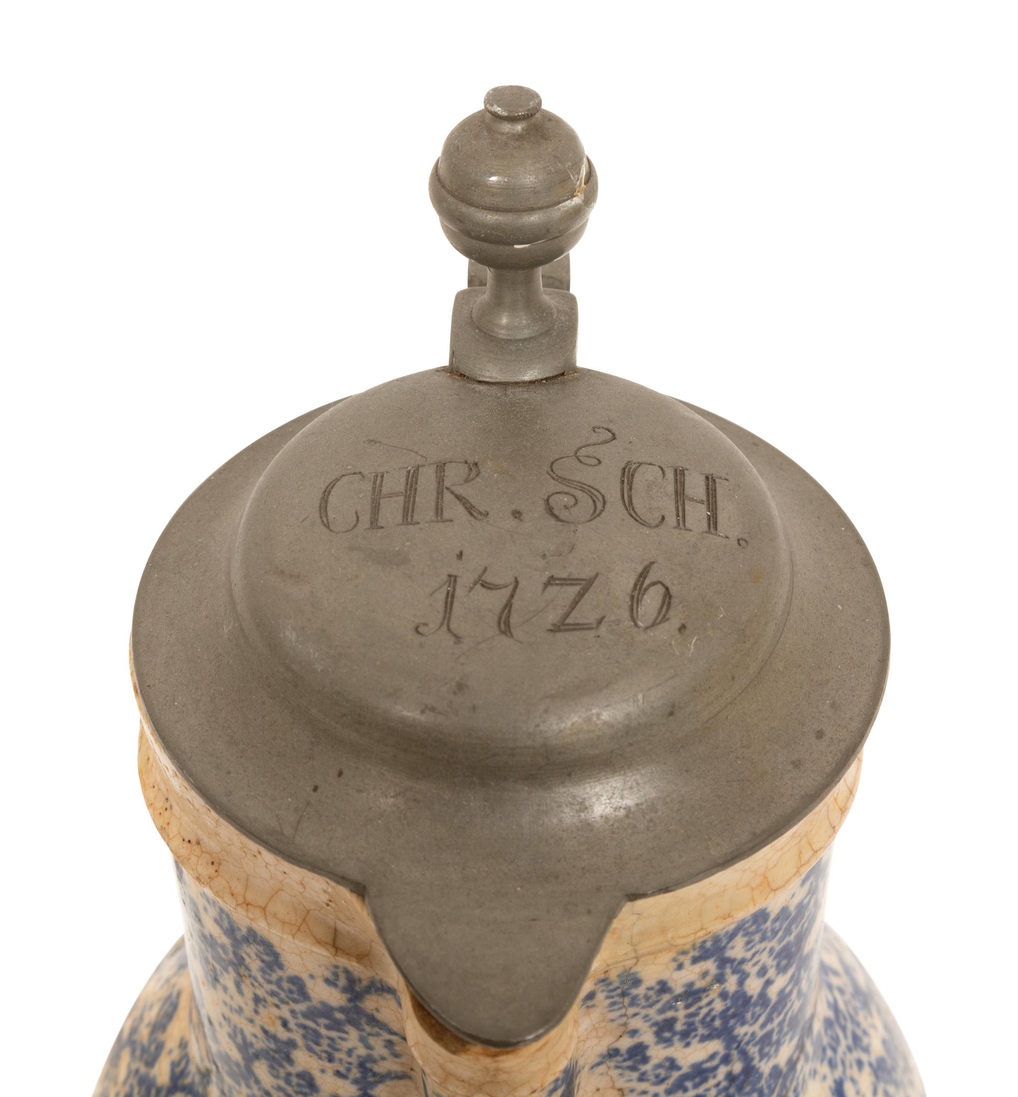 A Pewter Mounted Blue and White Spatterware Tankard