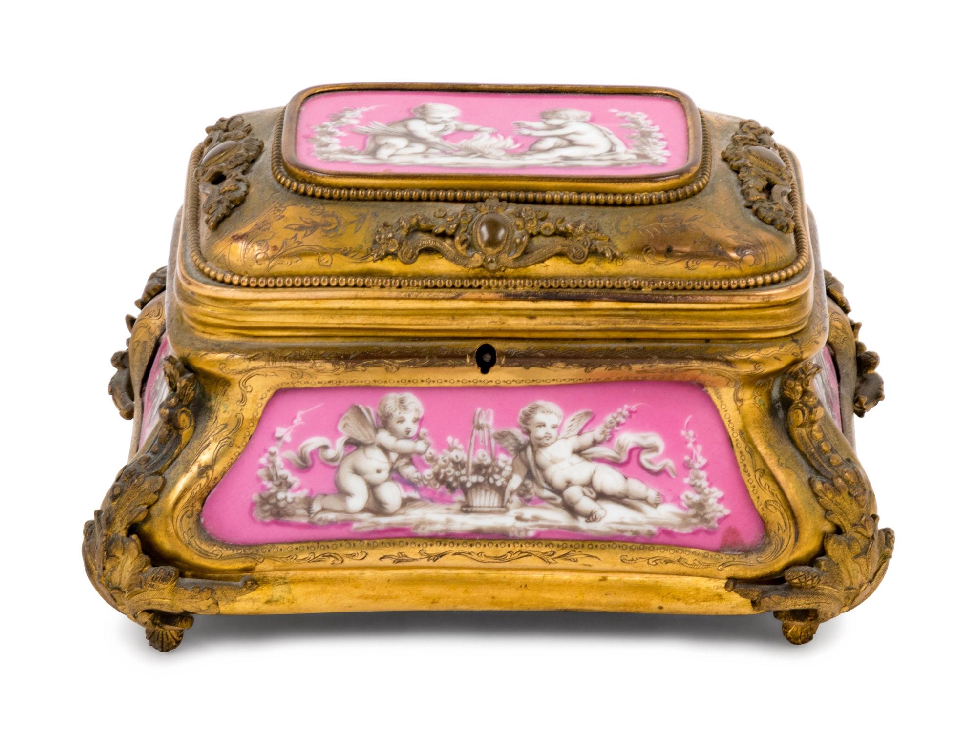 A French Gilt Bronze and Porcelain Inset Table Casket