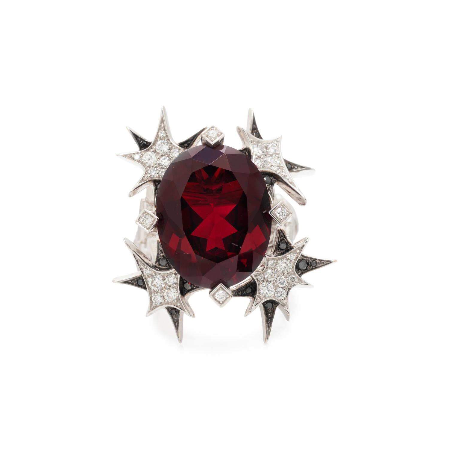 STEPHEN WEBSTER, GARNET, DIAMOND, AND BLACK DIAMOND 'PISTOL' RING