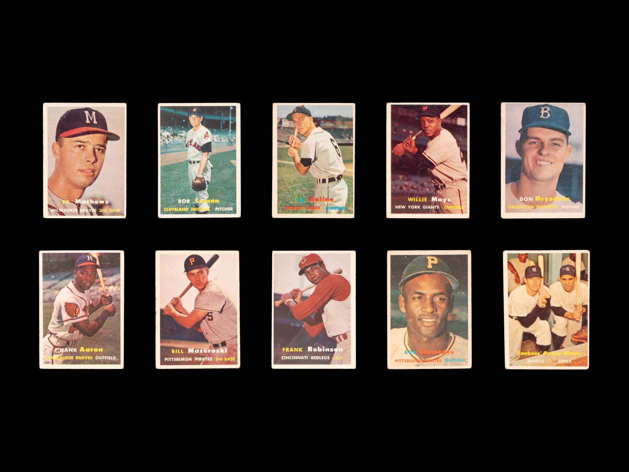 A Large Group of 1957 Topps Baseball Cards Featuring Hall of Famers and Rookie Cards,