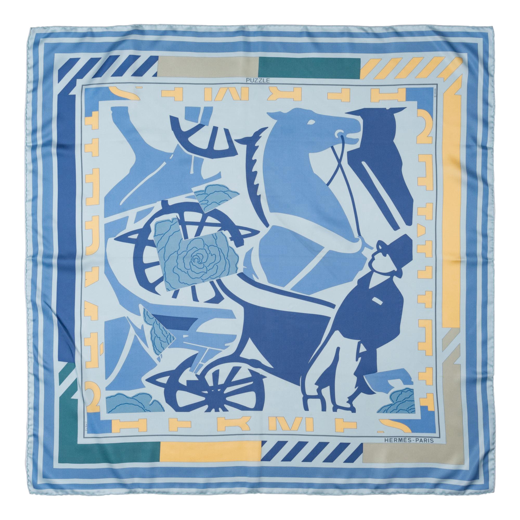A Group of Three Hermès Silk Scarves