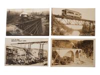 [RAILROADS]. A group of 71 RPPCs and photographs of trains, incl. train wrecks.