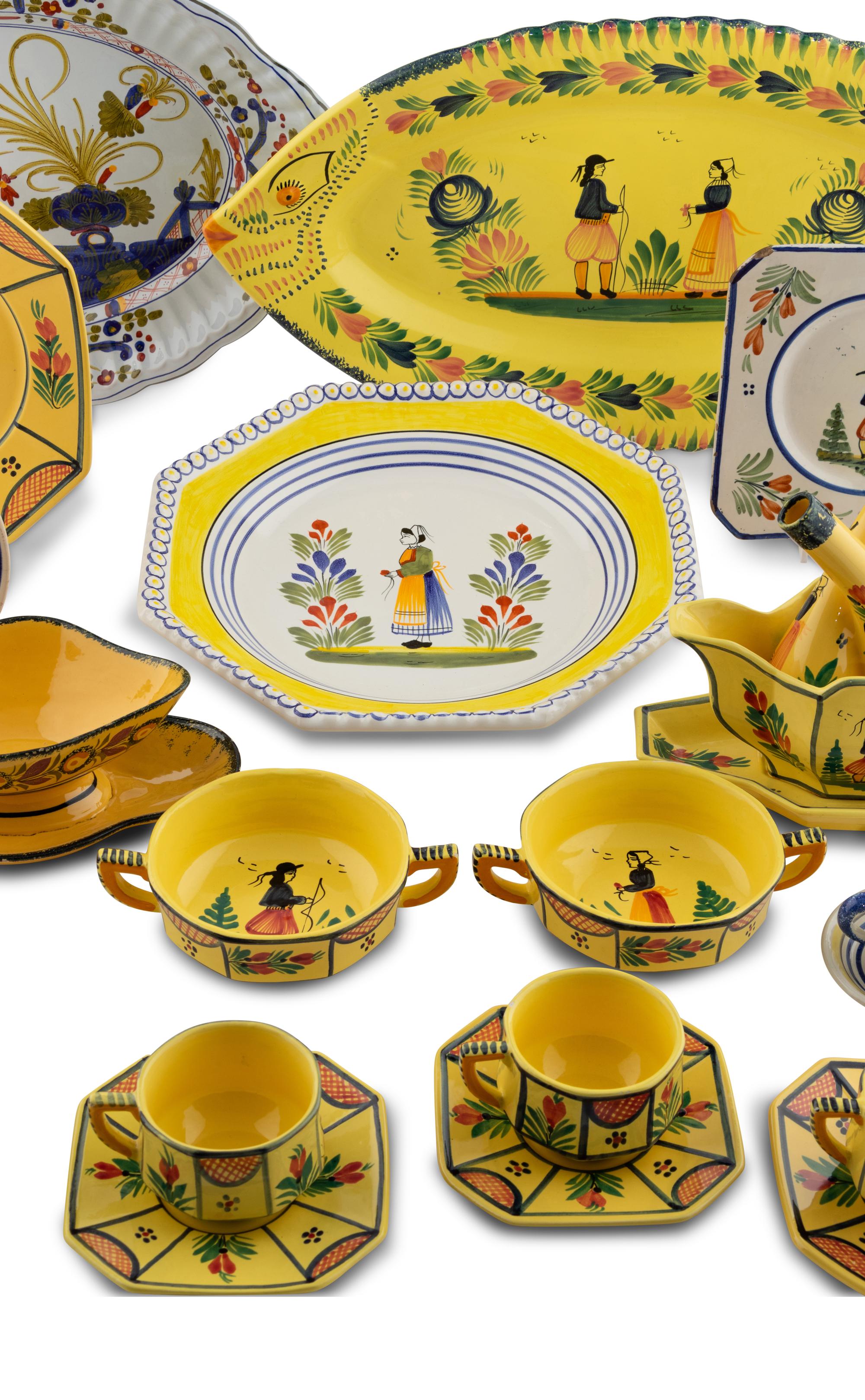 An Assembled Set of French Quimper Dinnerware