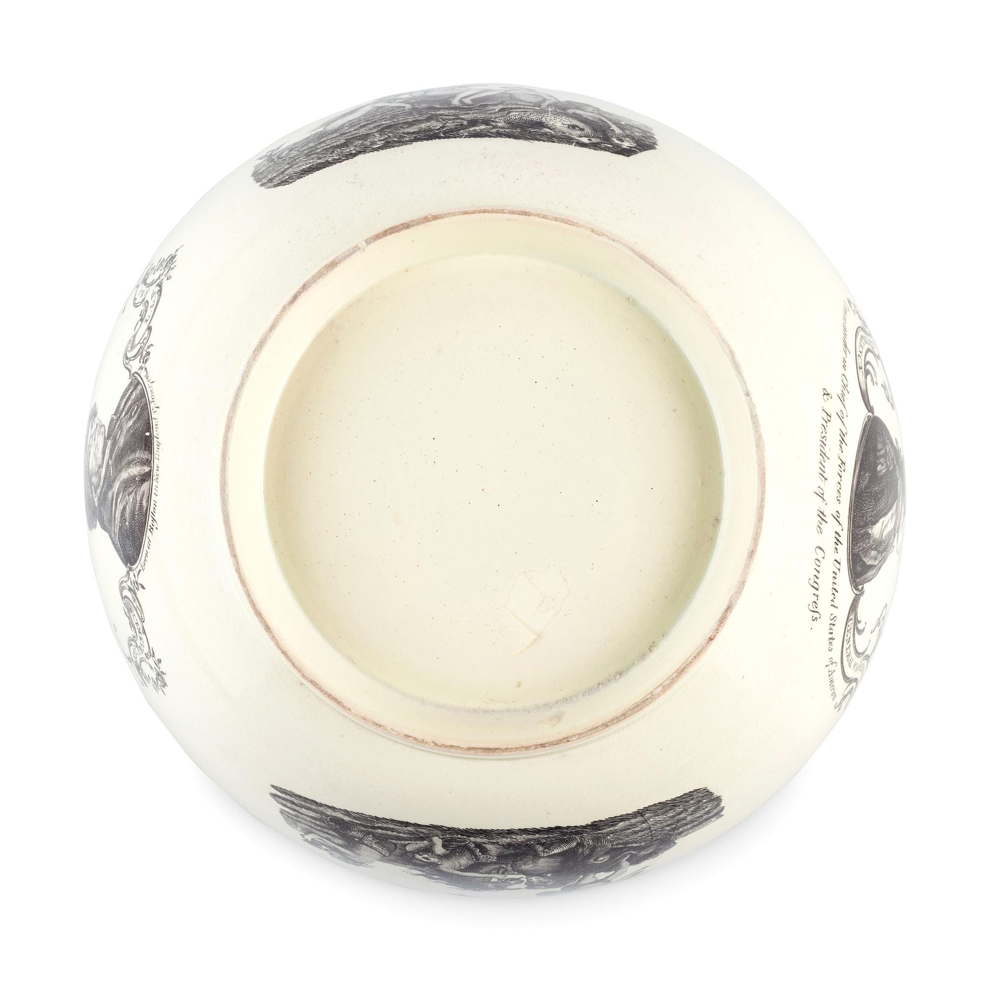 [ADAMS, John (1735-1826)]. Liverpool creamware punch bowl featuring portraits of John Adams as President, Benjamin Franklin, and George Washington. Late 18th/early 19th century.