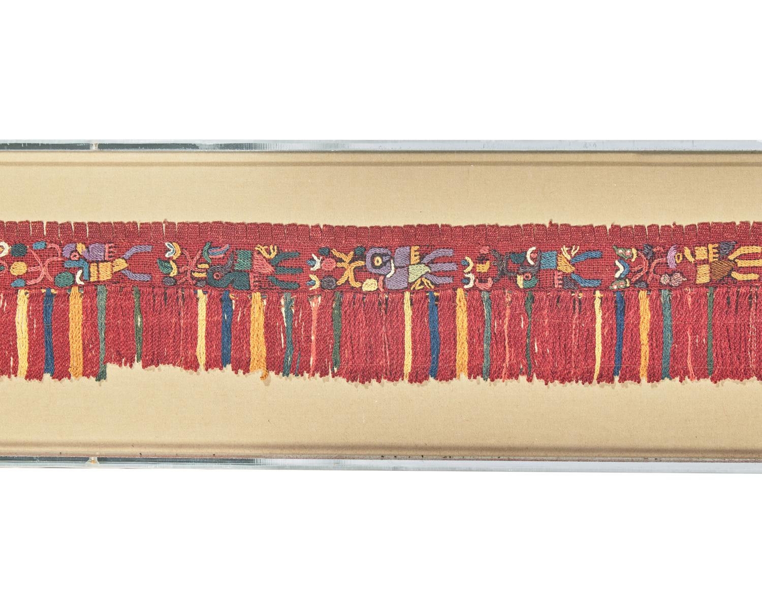 A Paracas Textile Panel from a Man’s Mantle Fringe with Bird Motif