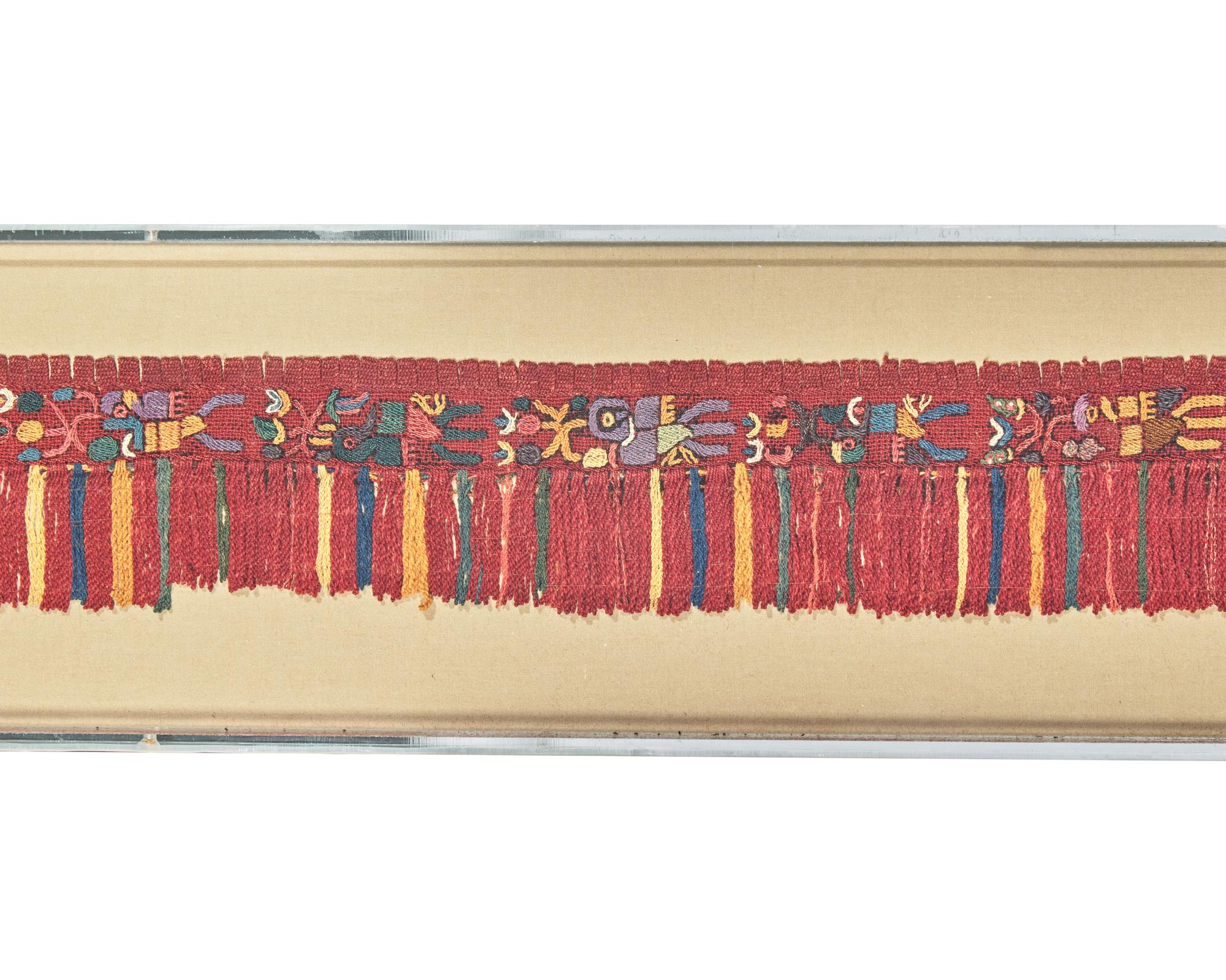 A Paracas Textile Panel from a Man’s Mantle Fringe with Bird Motif