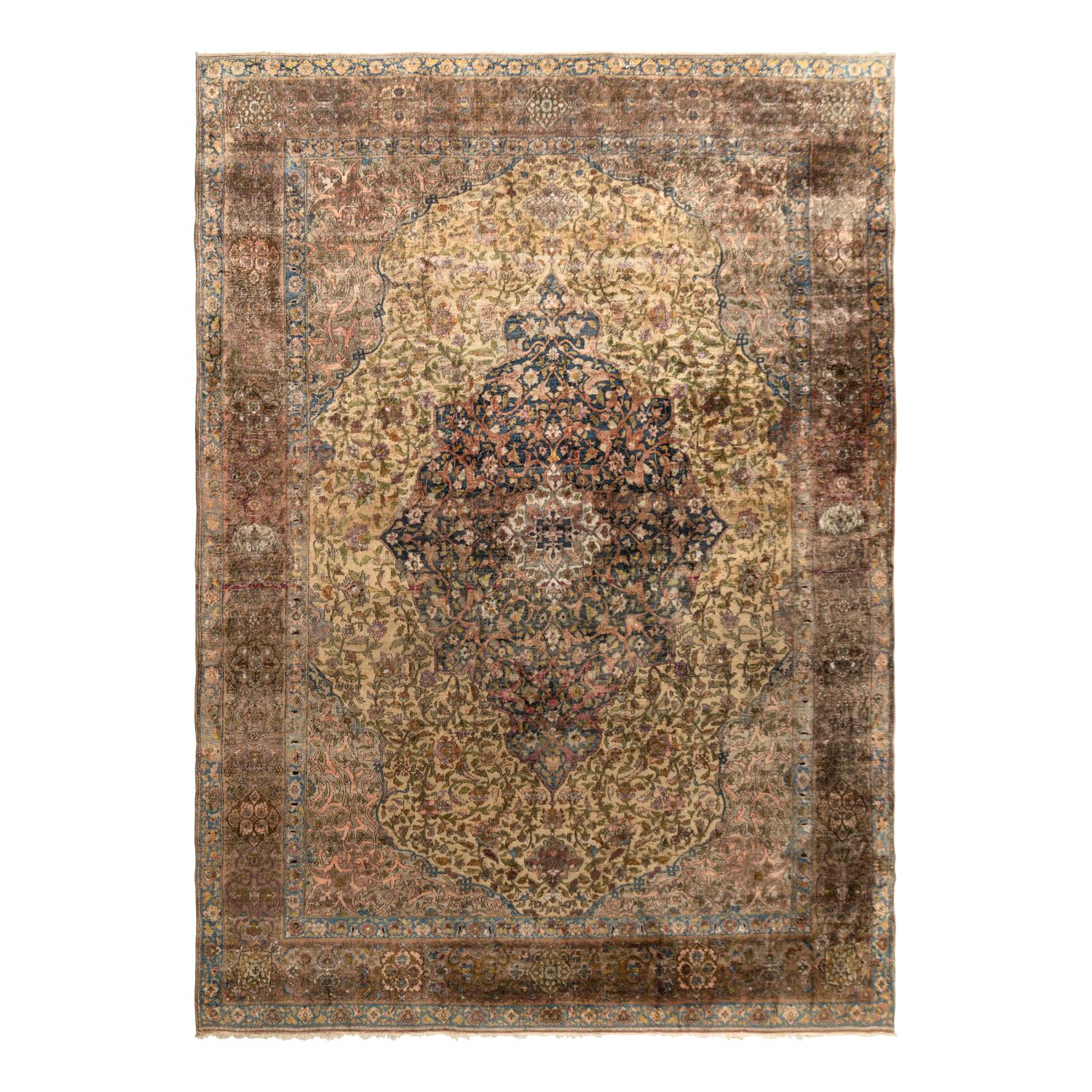 A Kashan Silk Carpet