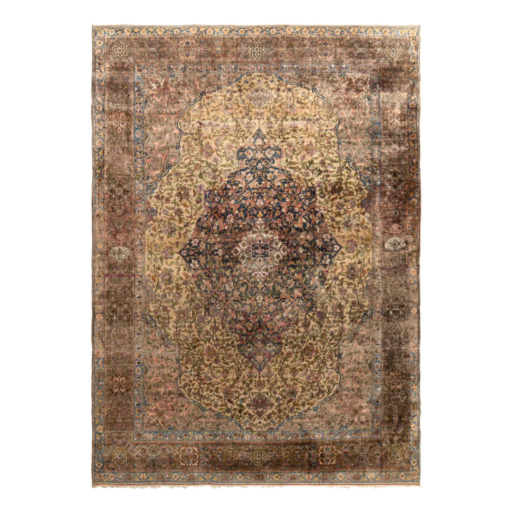 A Kashan Silk Carpet