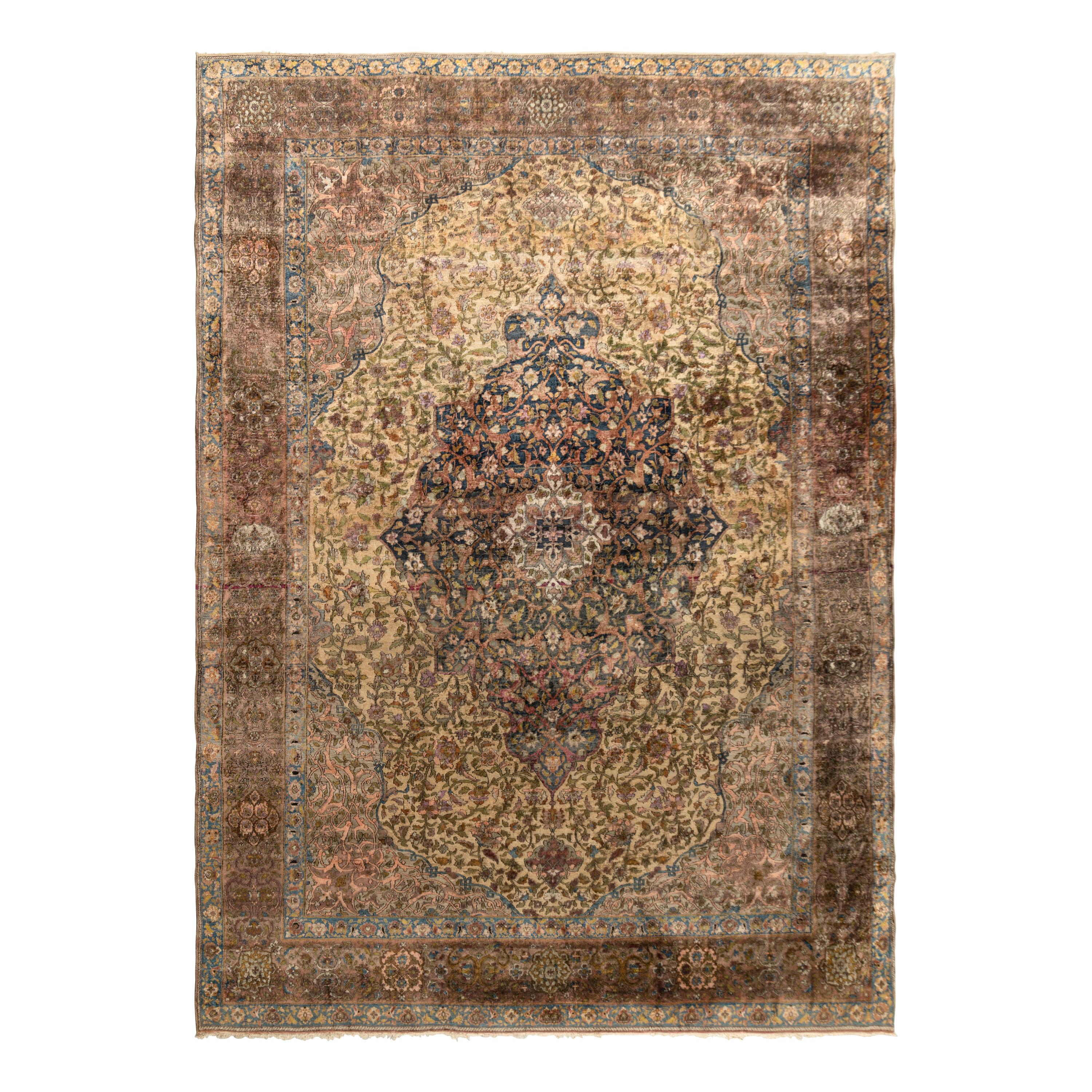 A Kashan Silk Carpet