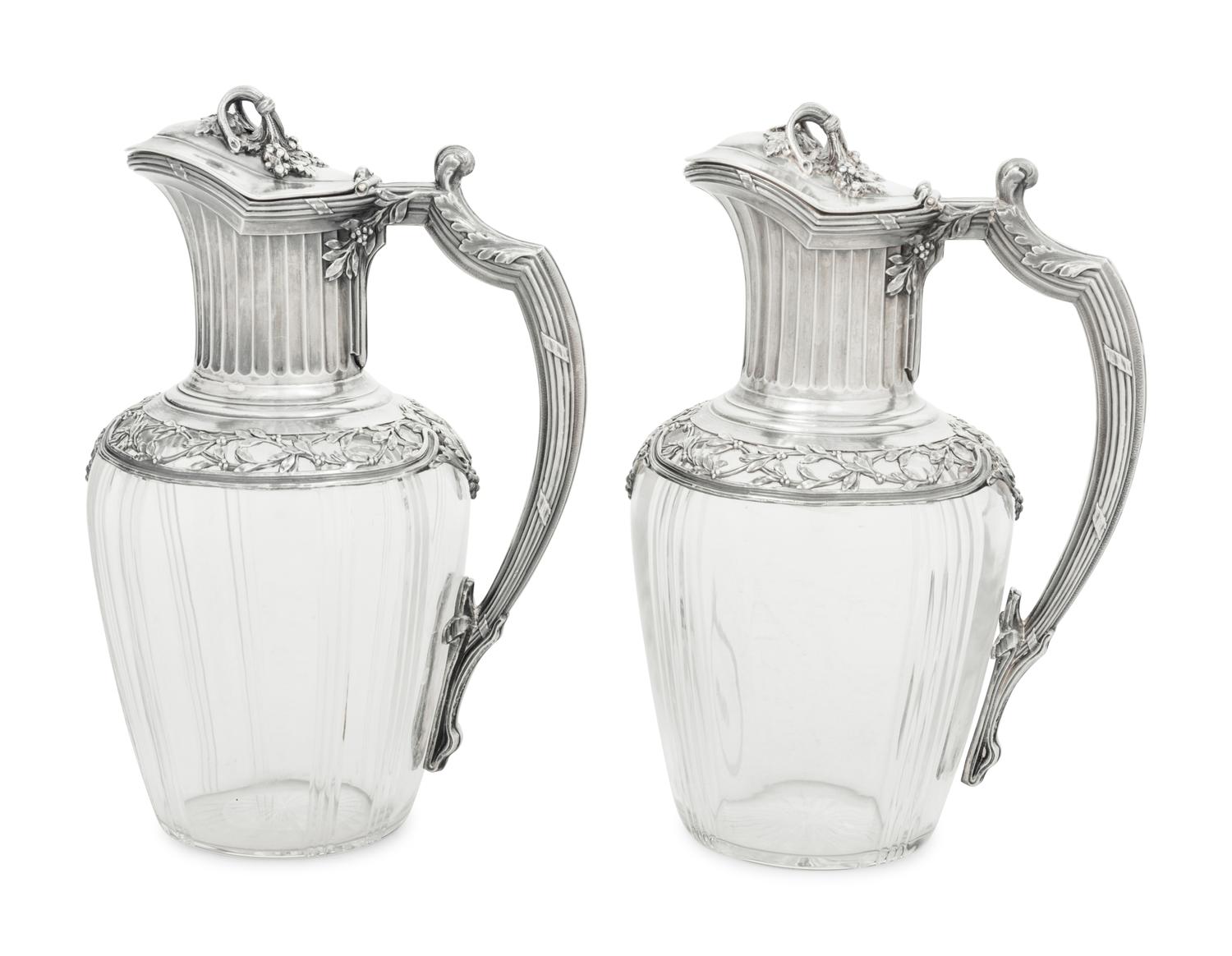 A Pair of French Silver and Glass Claret Jugs