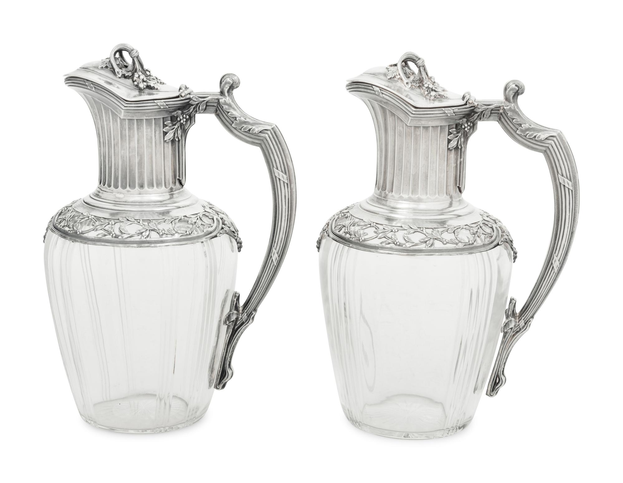 A Pair of French Silver and Glass Claret Jugs