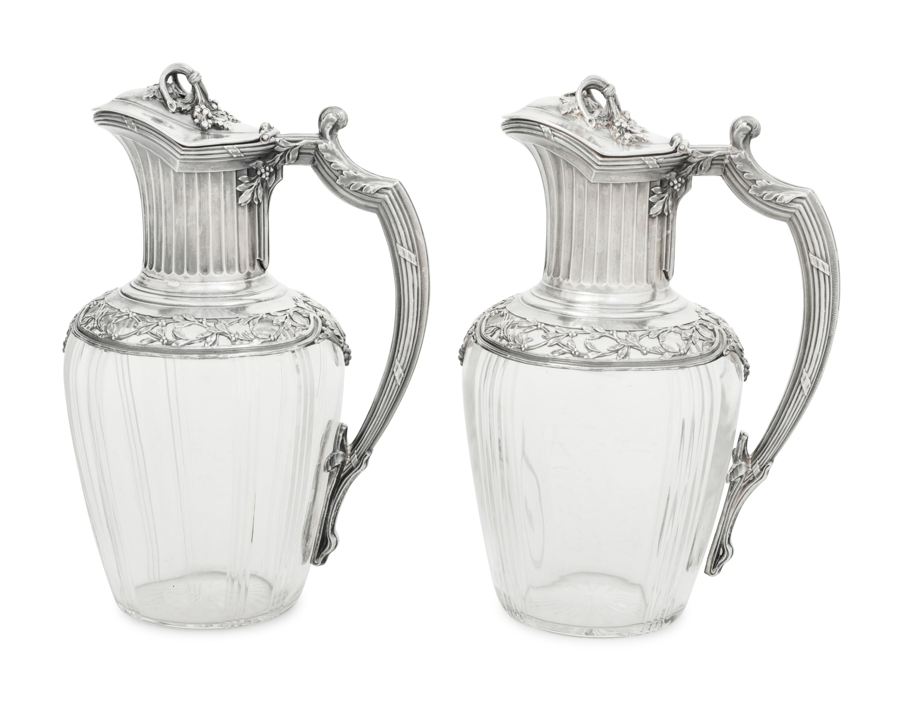 A Pair of French Silver and Glass Claret Jugs