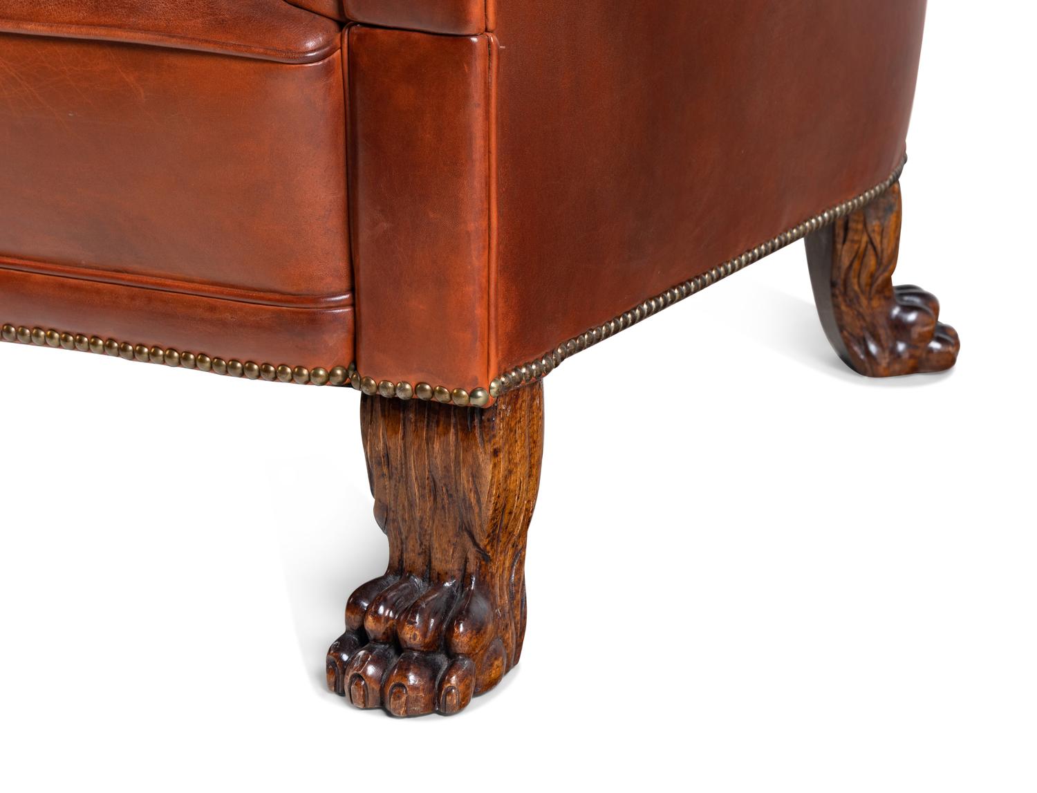 A Leather-Upholstered Mahogany Three-Piece Seating Suite