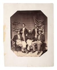 [WESTERN AMERICANA]. Studio photograph showing a group of identified advance scouts working for the Union Pacific Railroad. Ca 1867.