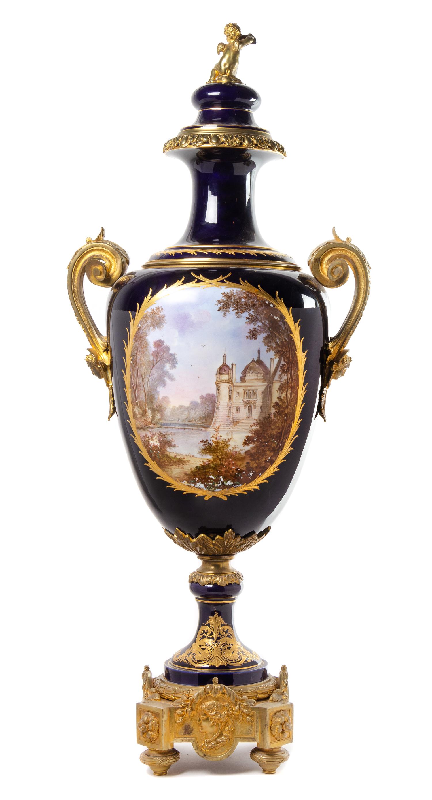 A Sevres Style Gilt Bronze Mounted Porcelain Lidded Urn Height 46 inches. — LATE 19TH/EARLY 20TH CENTURY