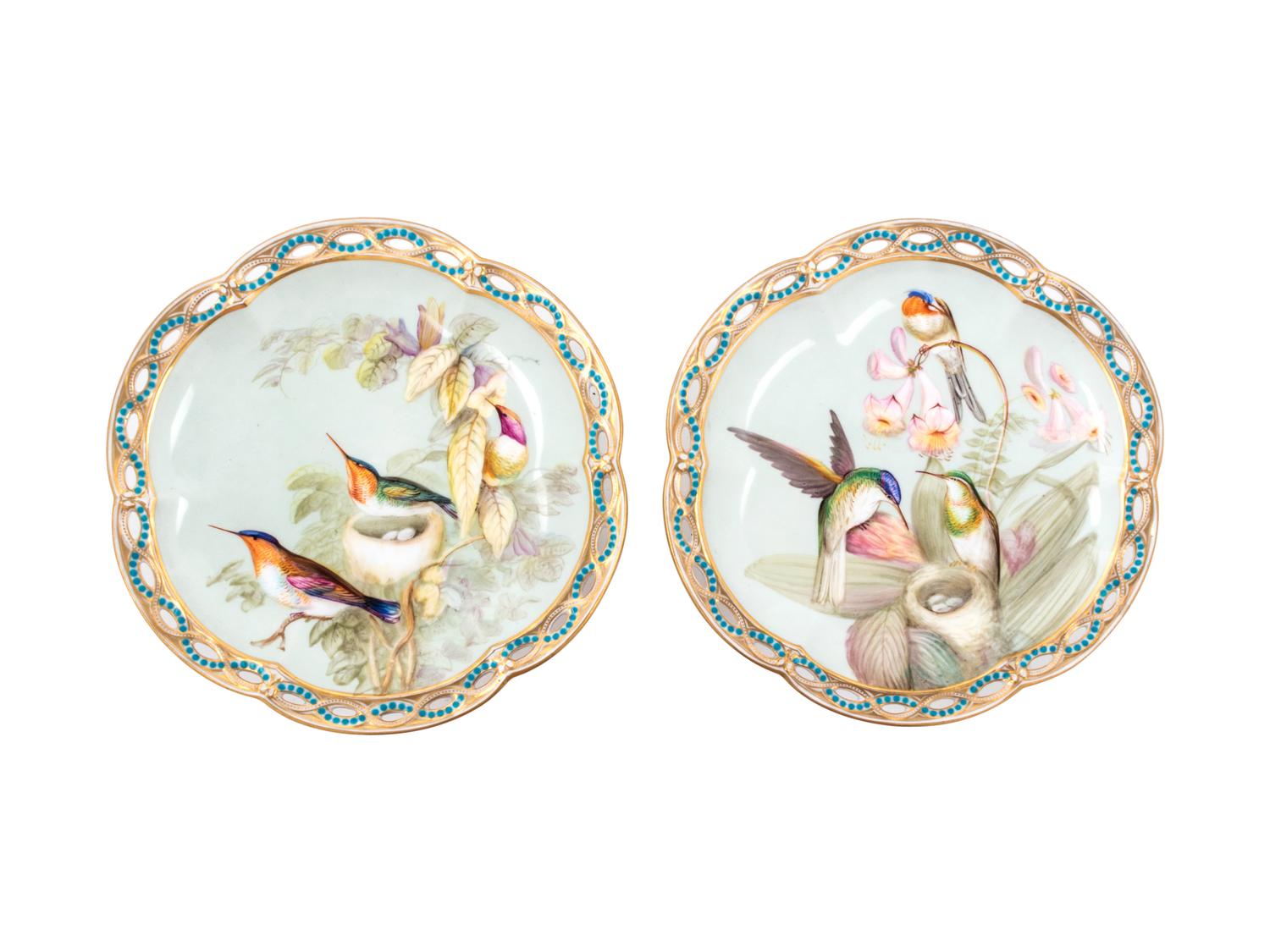 A Pair of Continental Ornithological Painted and Parcel Gilt Porcelain Compotes