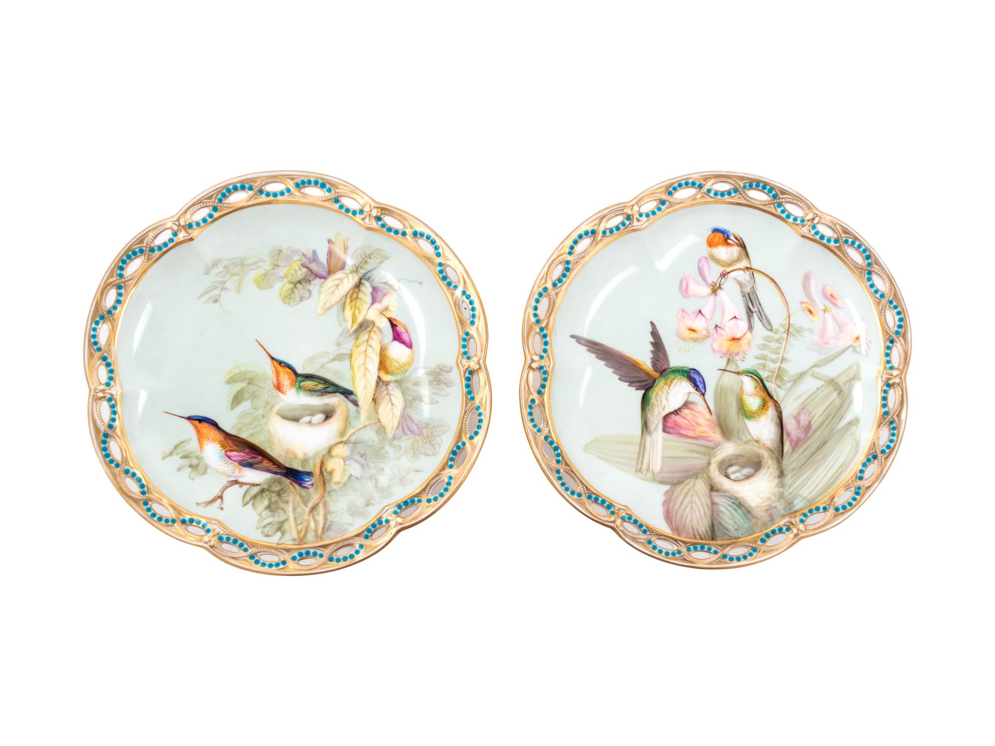 A Pair of Continental Ornithological Painted and Parcel Gilt Porcelain Compotes