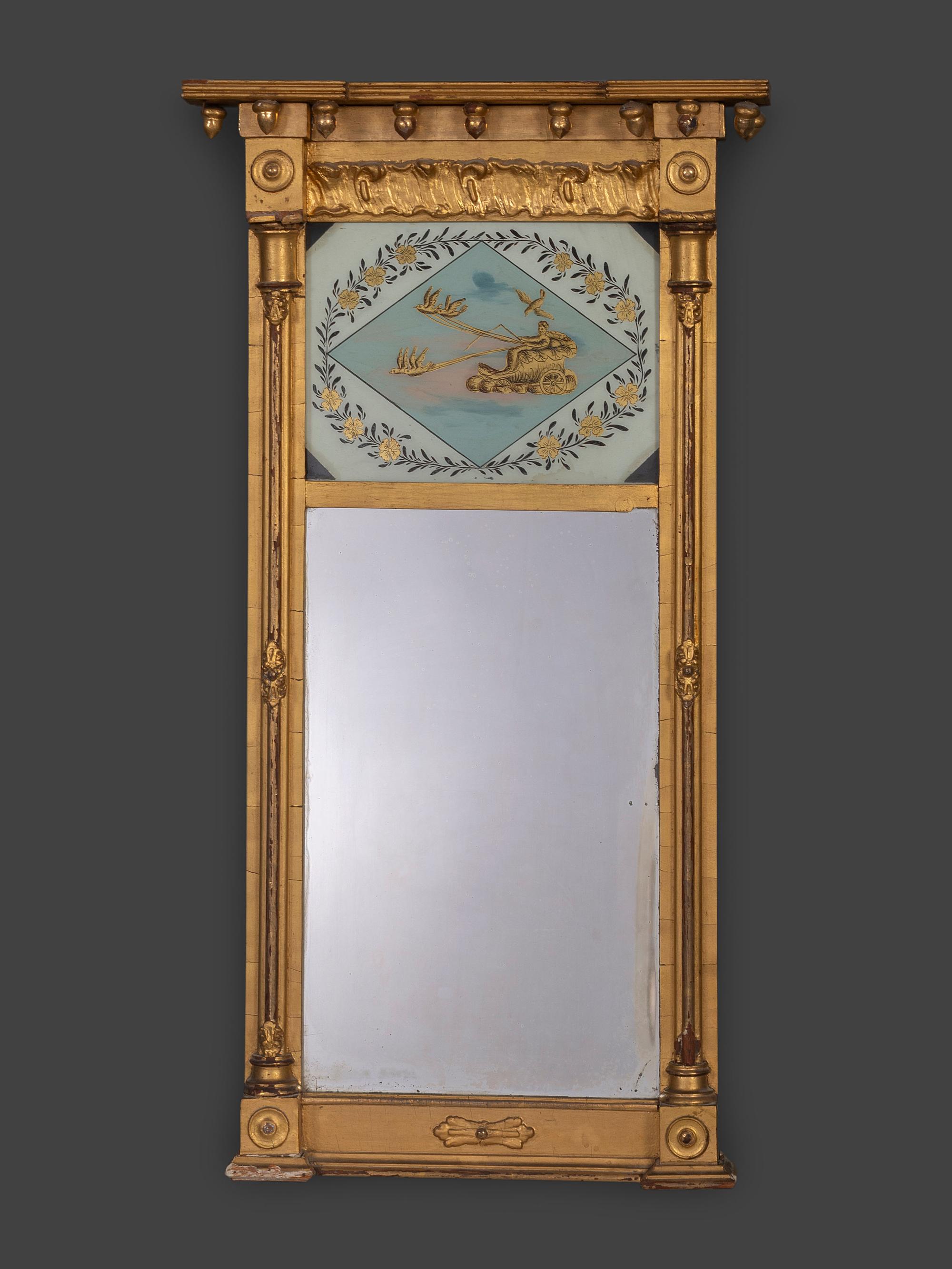 A Federal Giltwood and Eglomise Decorated Looking Glass