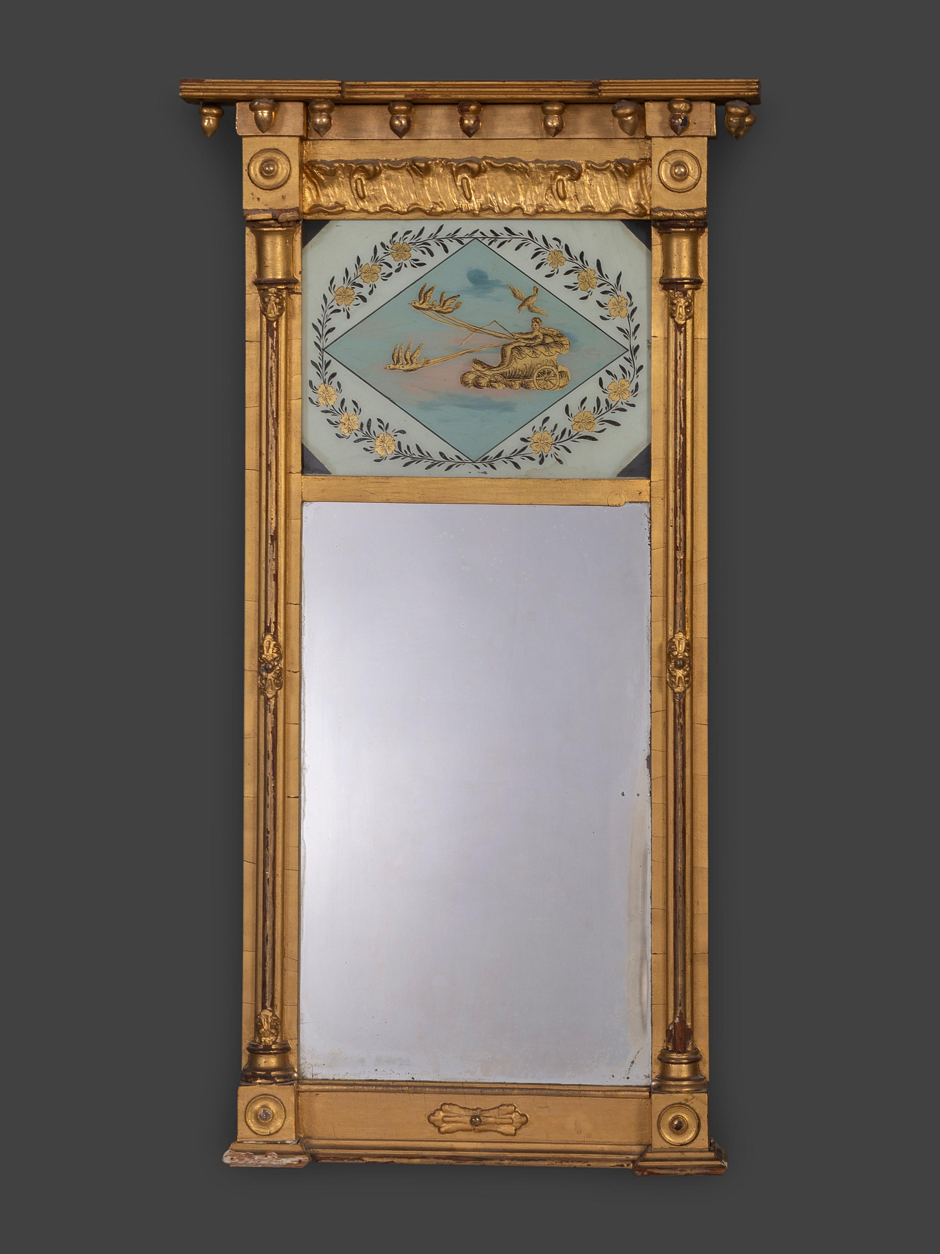 A Federal Giltwood and Eglomise Decorated Looking Glass