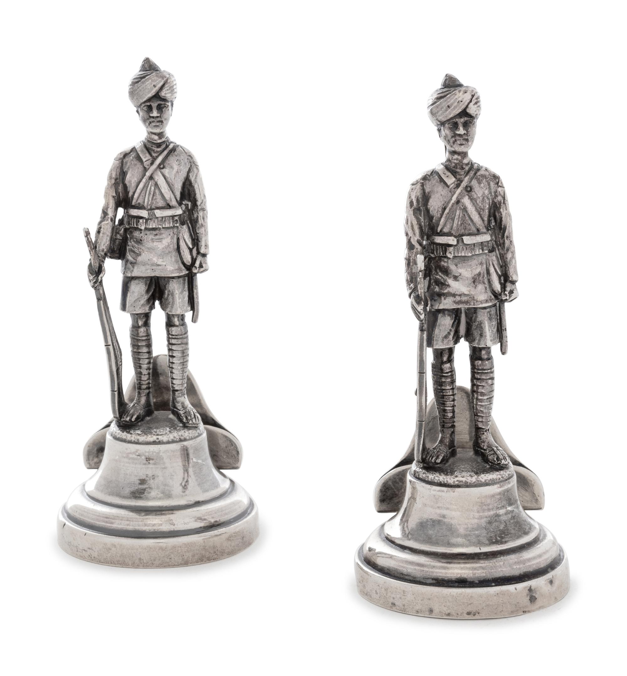 A Pair of Edwardian Silver Figural Menu-Card Holders