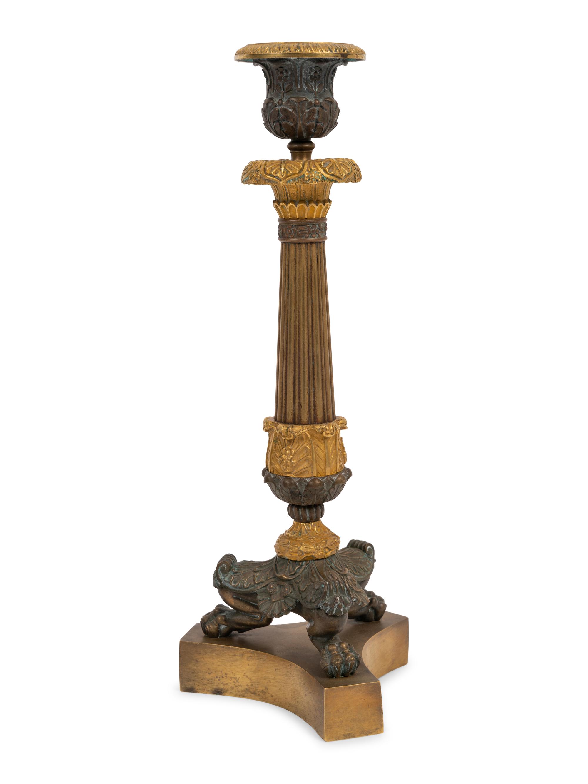 A Pair of Neoclassical Style Gilt and Patinated Bronze Candlesticks