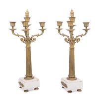 A Pair of Continental Gilt Bronze and Marble Three-Light Candelabra