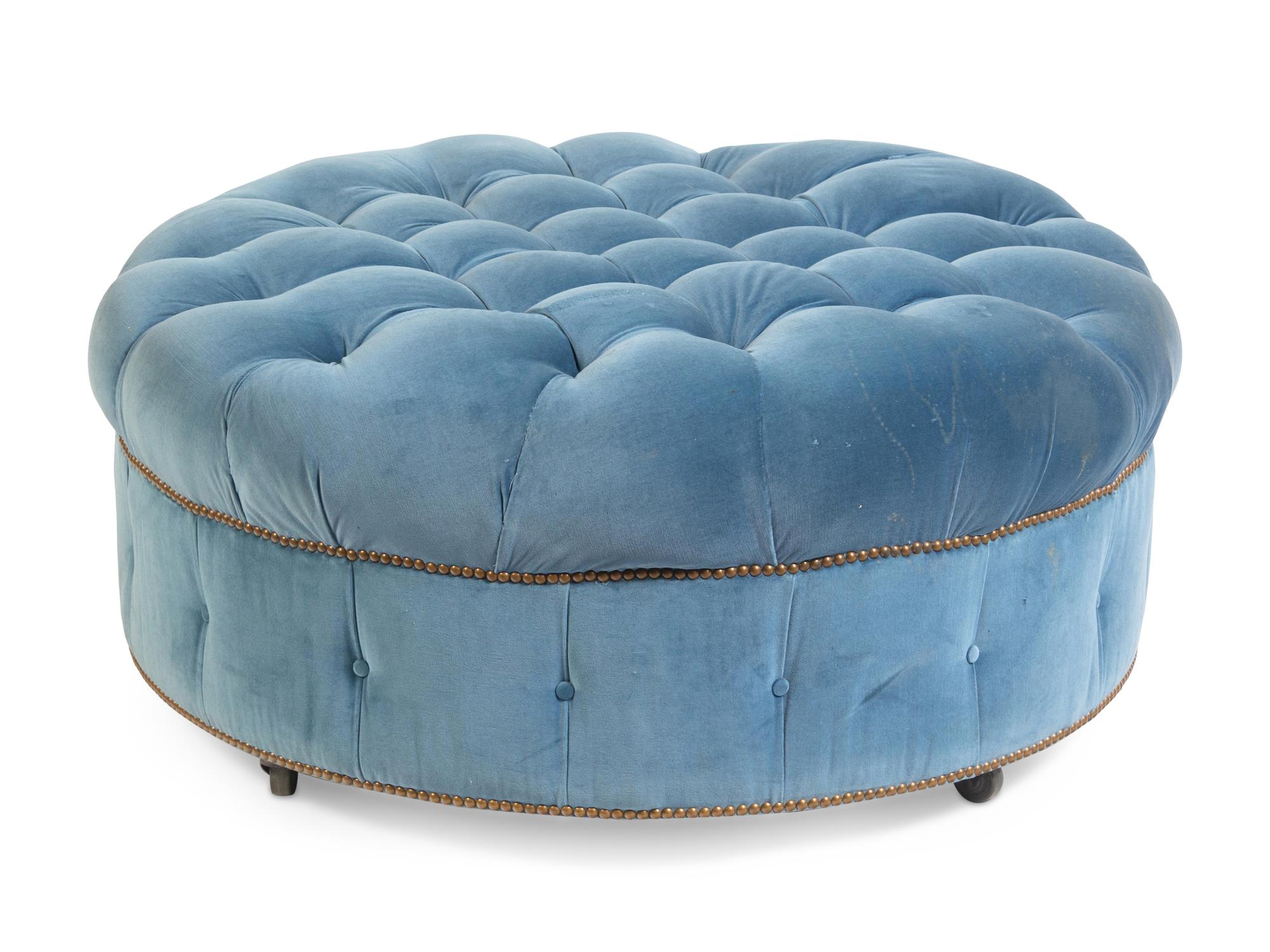 A Velvet-Upholstered Button-Tufted Ottoman