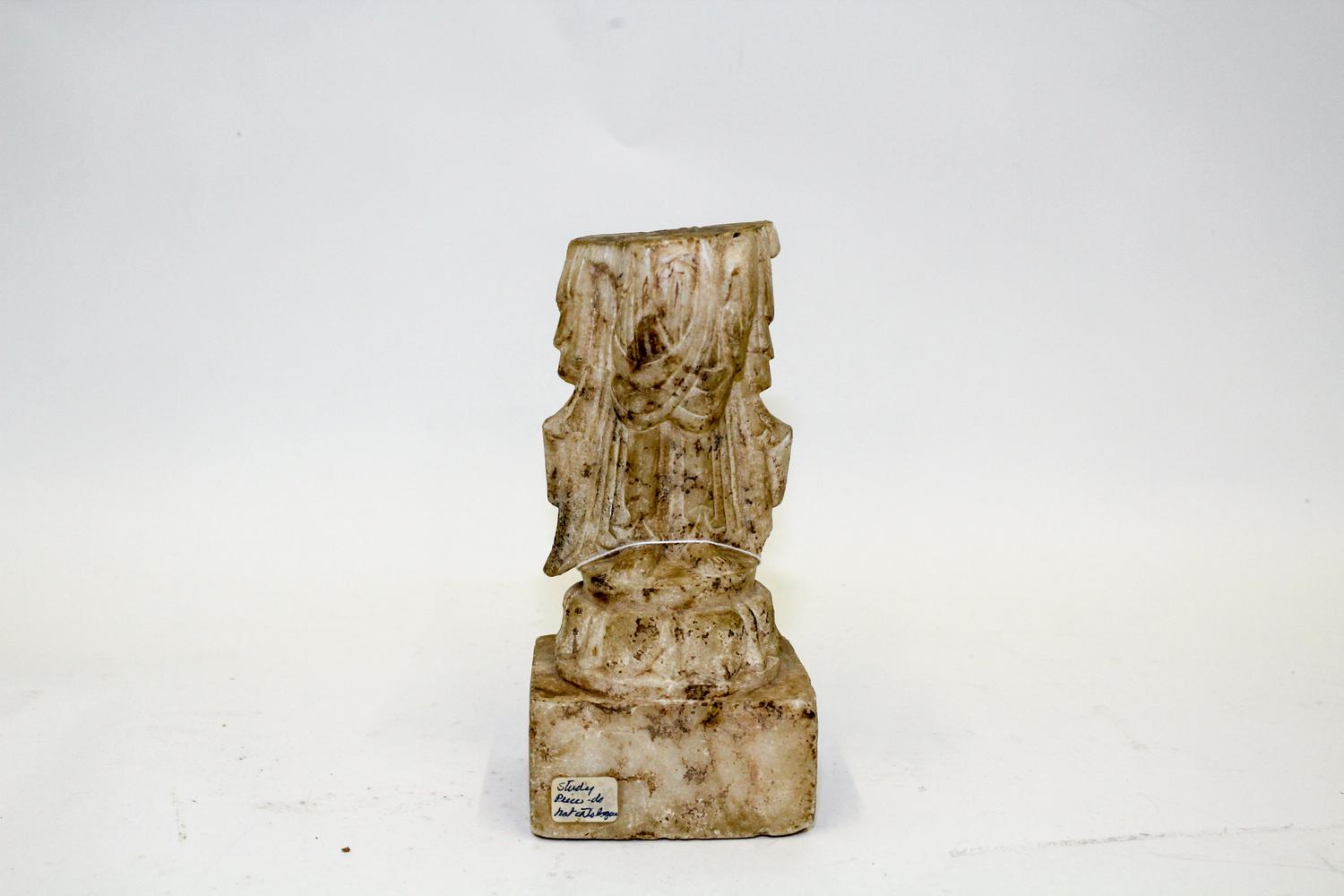 A Fragment of a Chinese Carved Marble Figure of Guanyin Height 8 1/4 inches. — MING DYNASTY