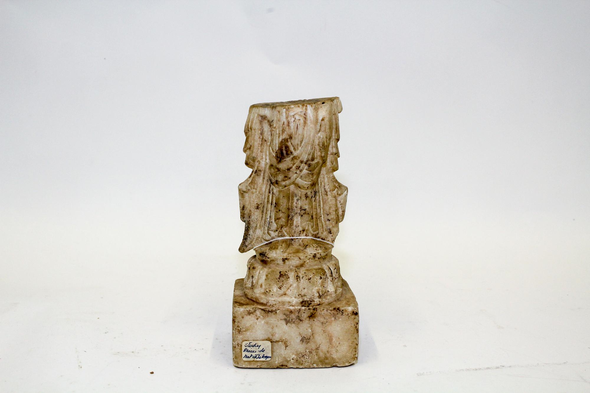 A Fragment of a Chinese Carved Marble Figure of Guanyin Height 8 1/4 inches. — MING DYNASTY