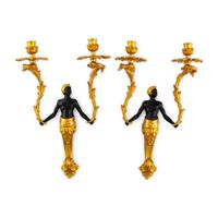 A Pair of French Gilt and Patinated Bronze Figural Two-Light Sconces