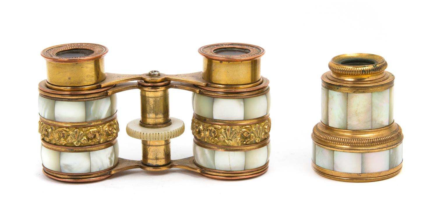 A Pair of French Mother-of-Pearl Veneered Opera Glasses, Width of widest 3 7/8 inches.