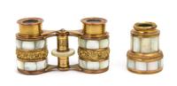 A Pair of French Mother-of-Pearl Veneered Opera Glasses, Width of widest 3 7/8 inches.