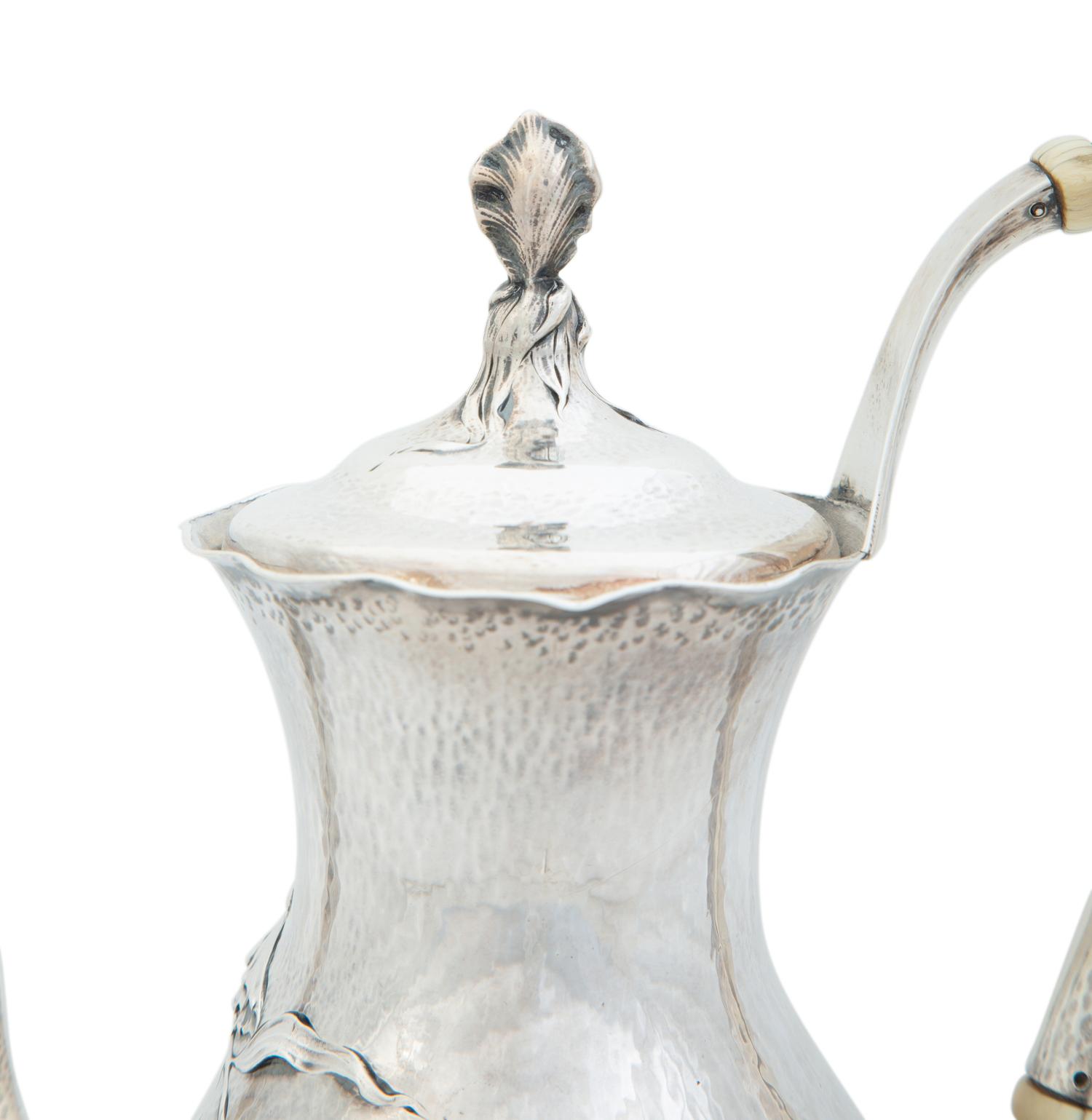 An American Silver Hand Hammered Silver Coffee Pot