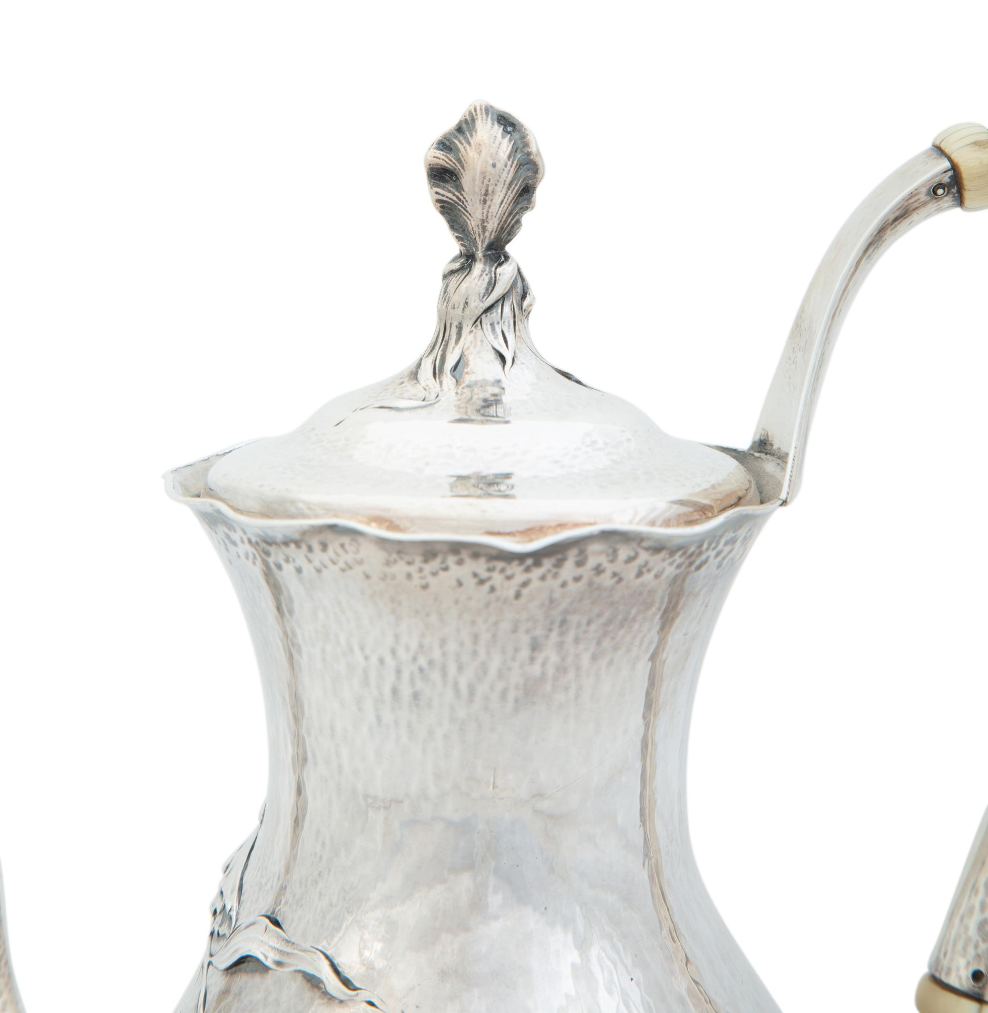 An American Silver Hand Hammered Silver Coffee Pot