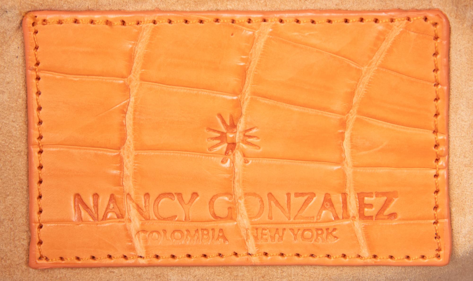 Nancy Gonzalez, Two Orange Handbags